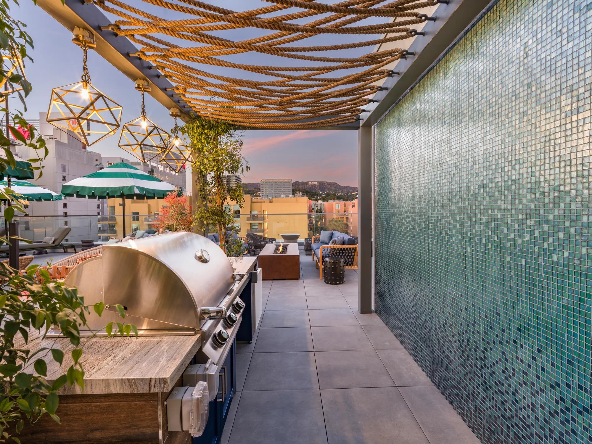 community courtyard with fire pits modera argyle apartments for rent in los angeles ca
