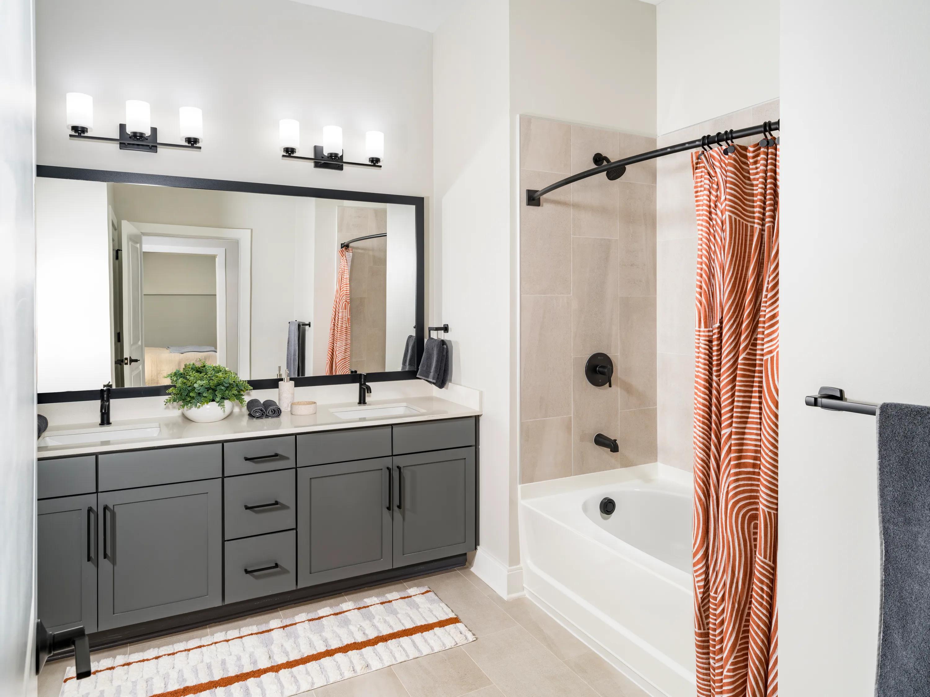double vanity bathroom with white cabinetry modera liberty row apartment homes for rent in in charlotte nc