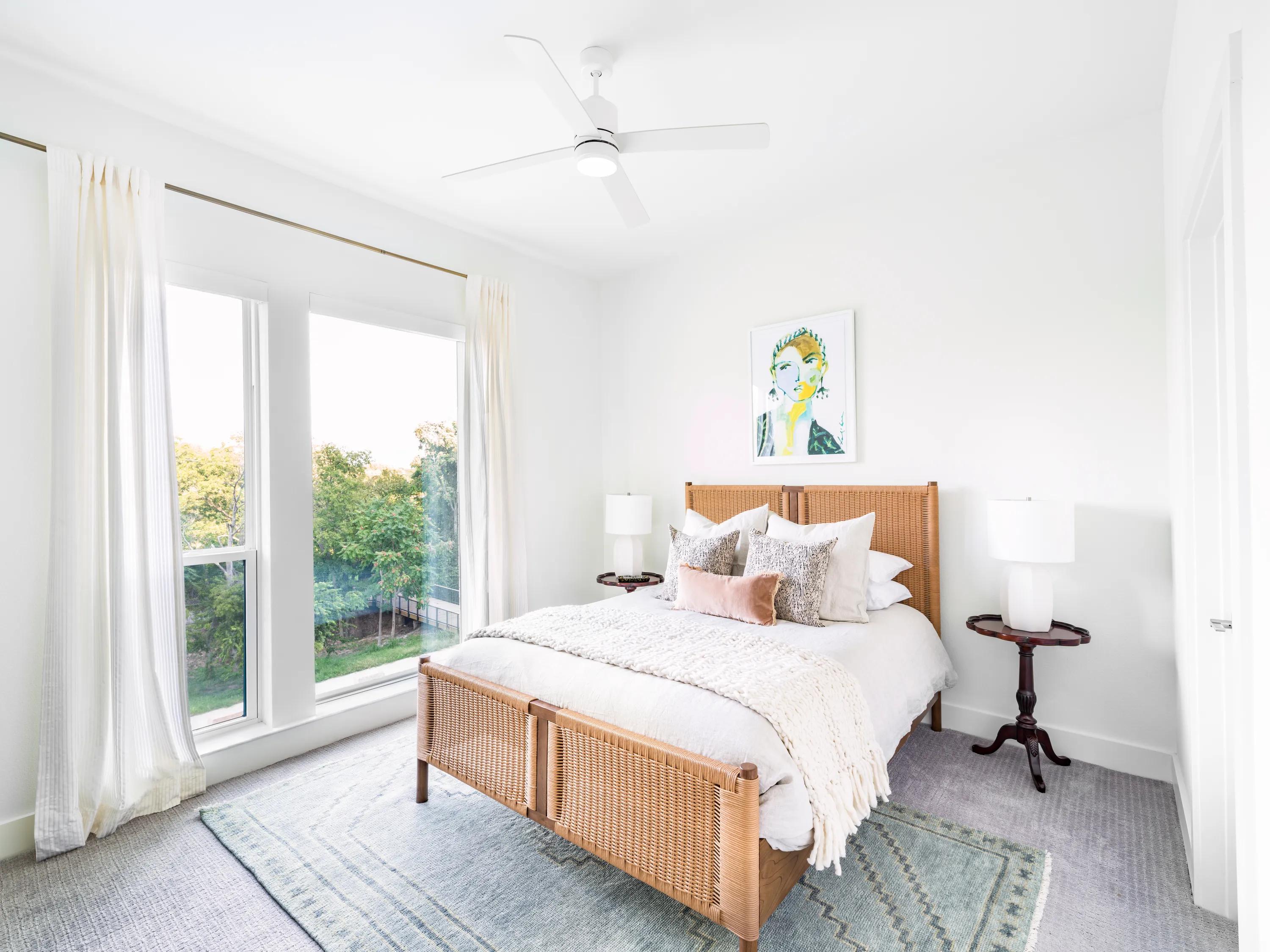 premium home bedroom with large windows and ceiling fan modera trailhead apartment homes for rent in dallas tx
