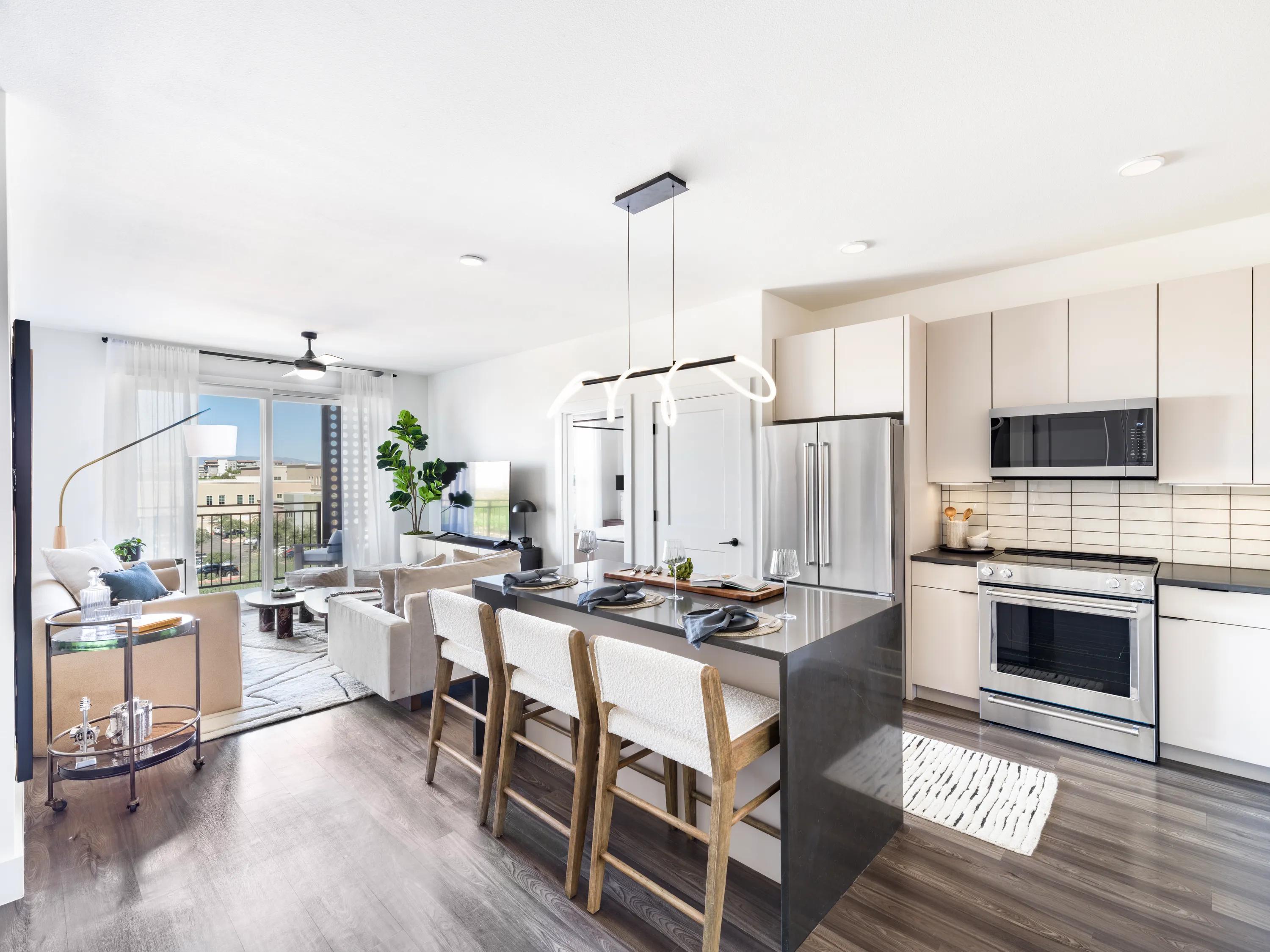 open concept kitchen with unique lighting modera kierland apartments homes for rent in scottsdale z
