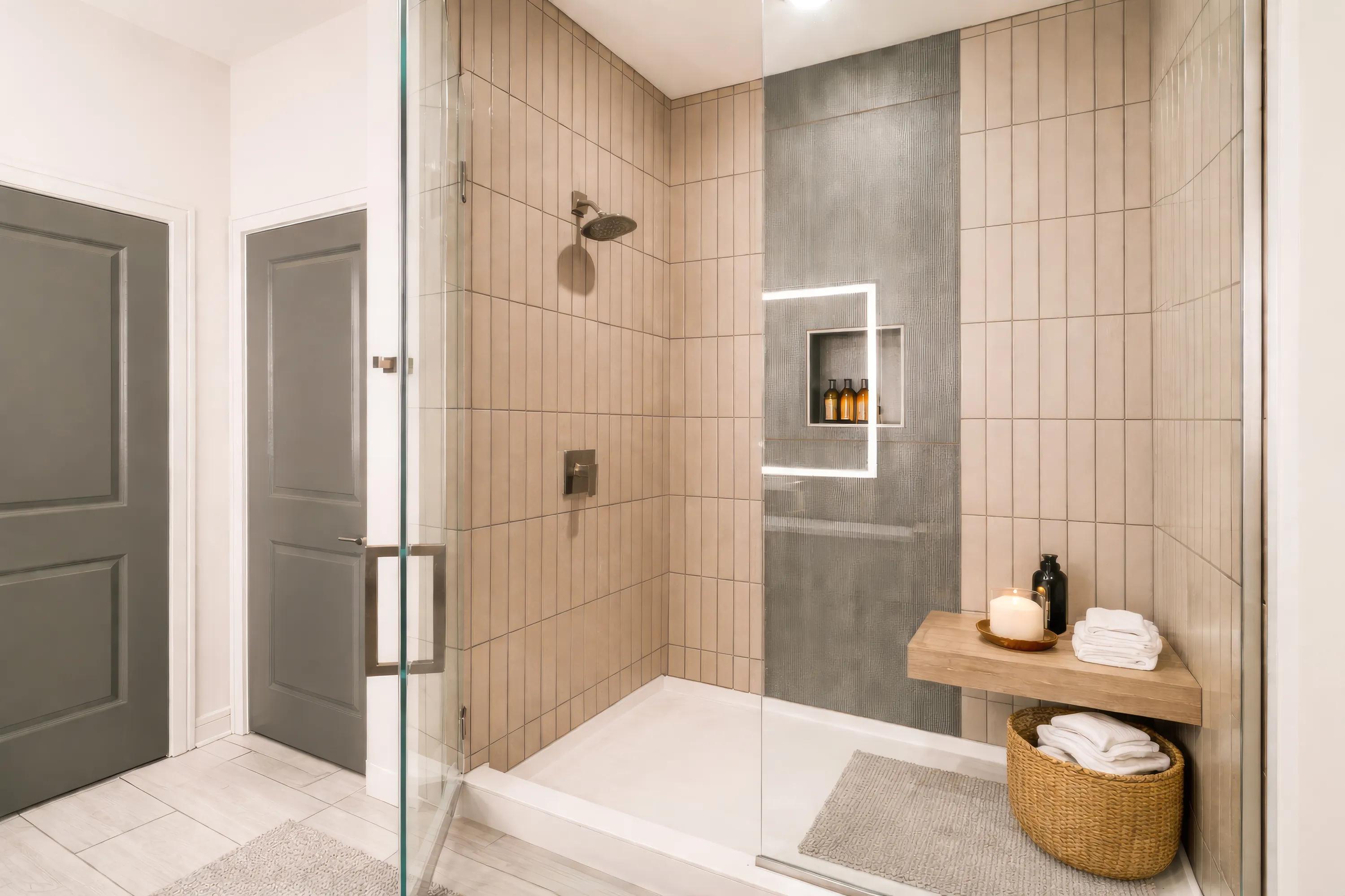 spa inspired bathroom with spacious shower and light wood interior modera parkside apartments penthouse