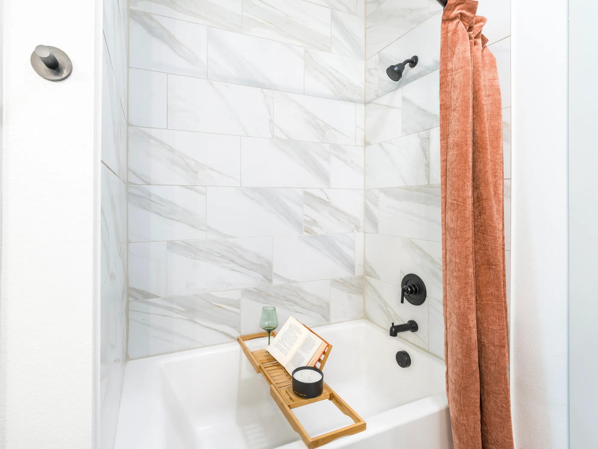 bathtub with bathroom accessories adorned modera mckinney ridge apartment homes for rent in tx