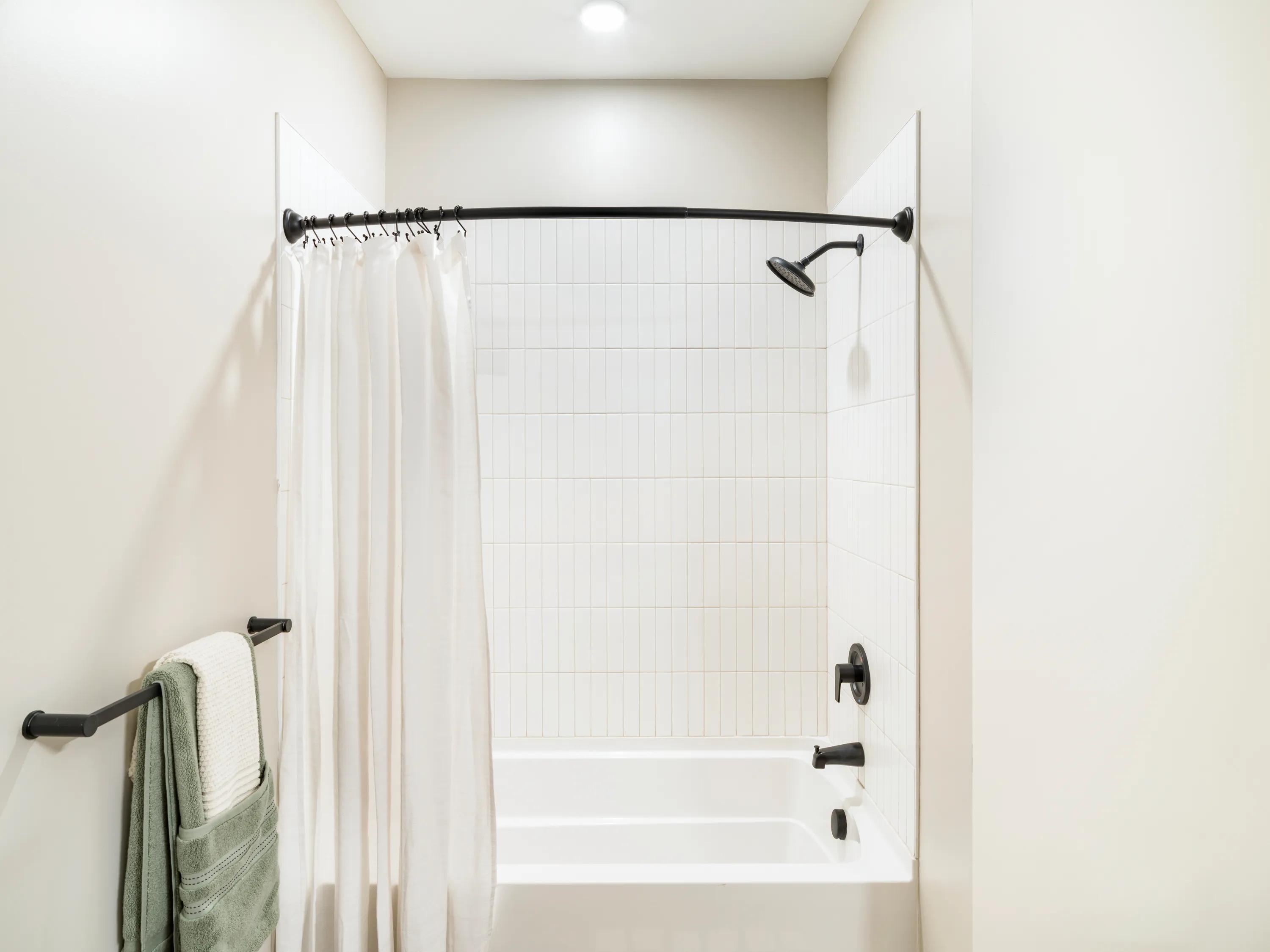 bathroom with shower and tub combo modera south shore apartment homes for rent in marshfield ma