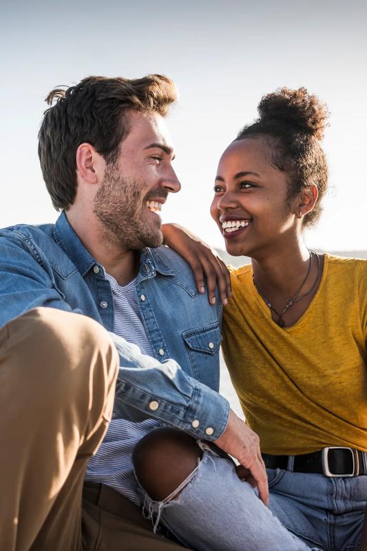Woman and Man Sitting together outside