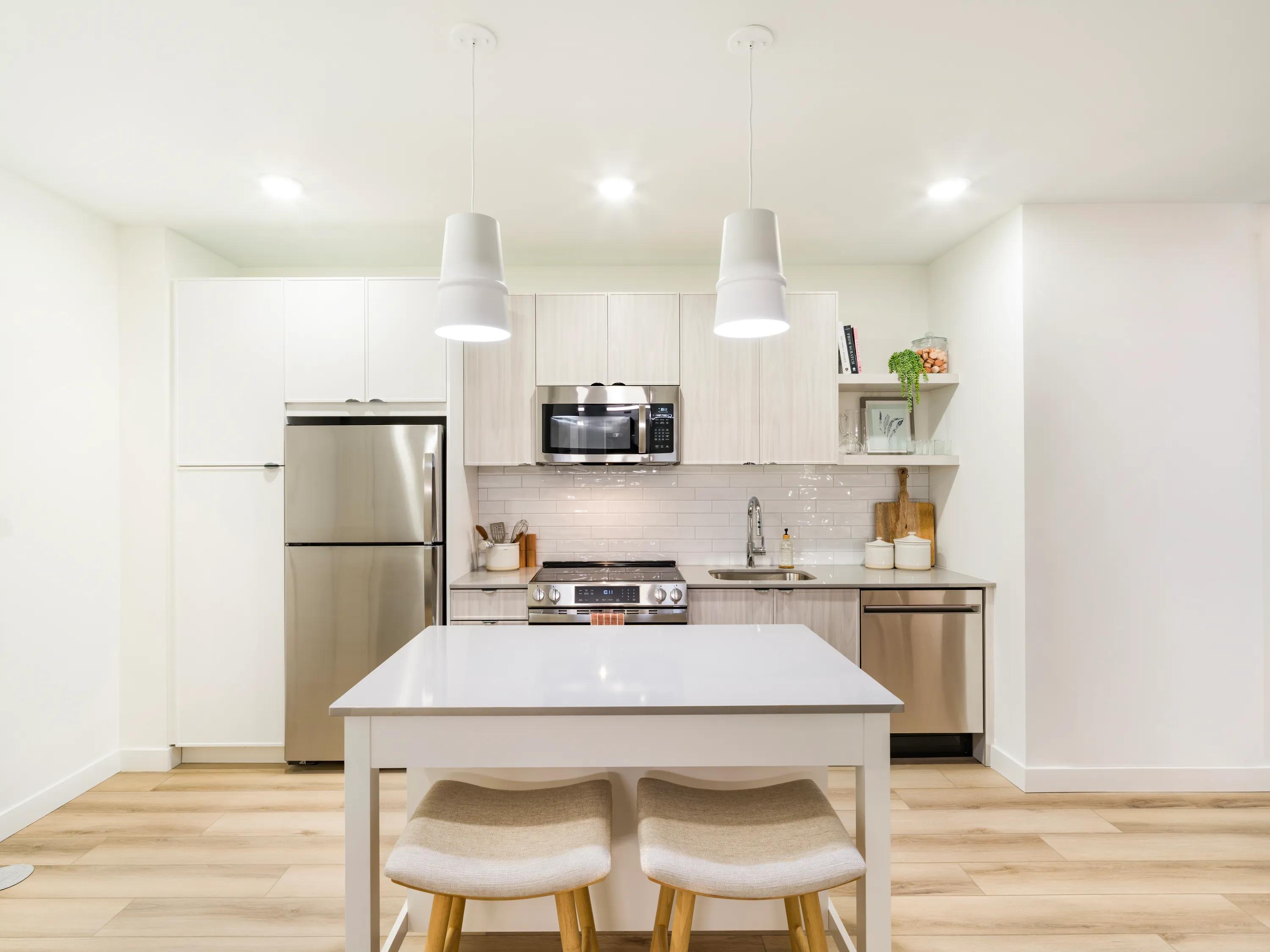 kitchen with stainless steel appliances modera revere beach apartment homes for rent in revere ma