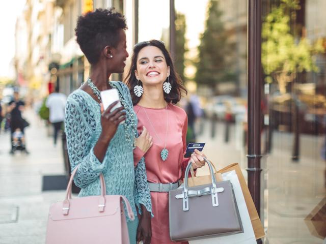 two friends shopping at mall together 580 anton apartments in costa mesa ca