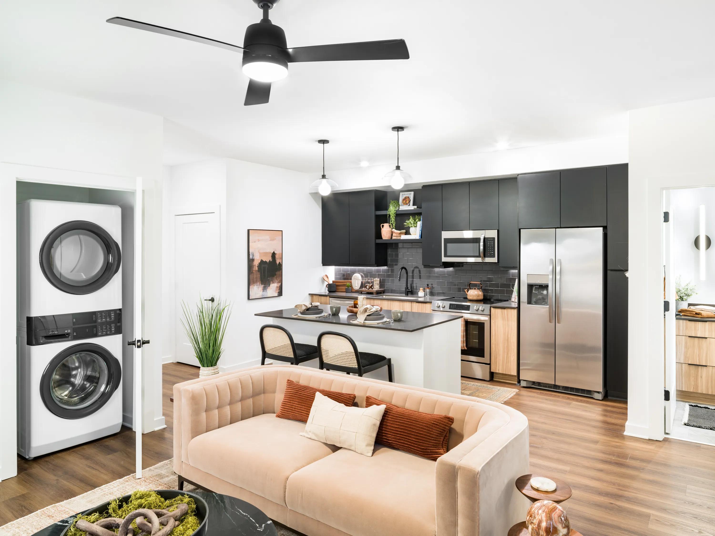 kitchen with dark cabinetry modera nations nashville tn apartments for rent