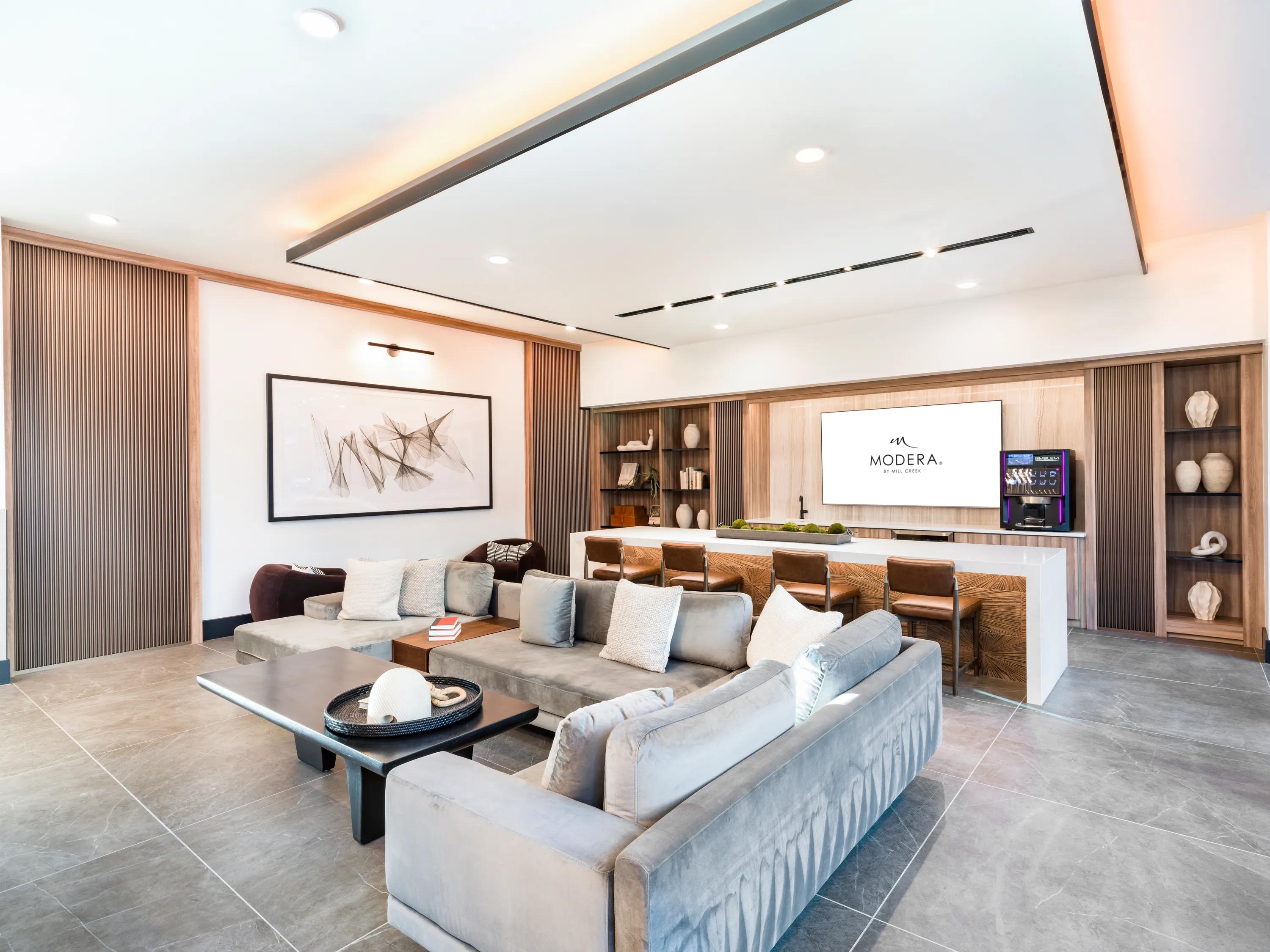 resident lounge with furniture and fireplace modera kierland apartment homes for rent in scottsdale az