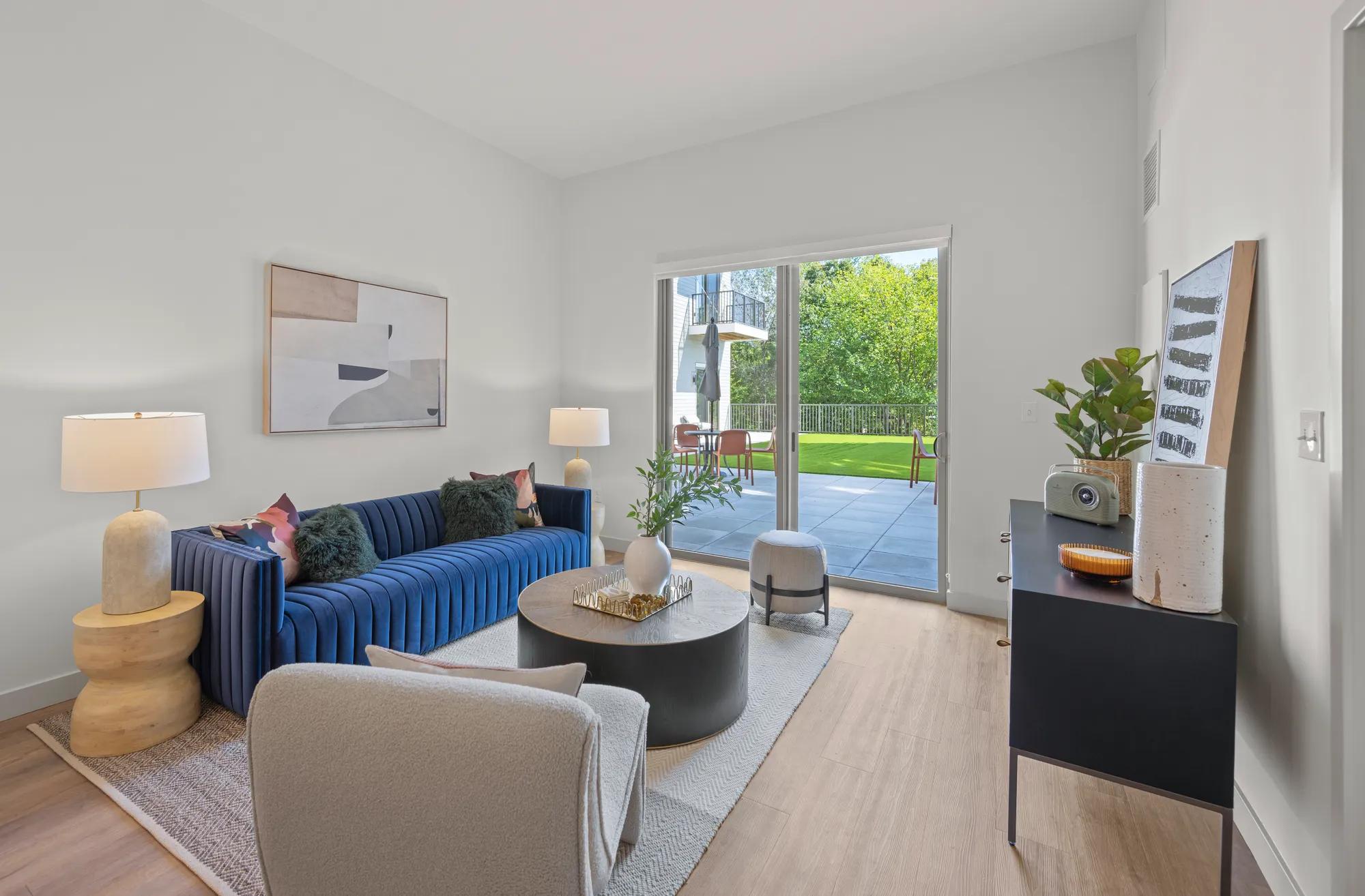 large apartment living room with tasteful furniture at modera newton apartment homes for rent in ma