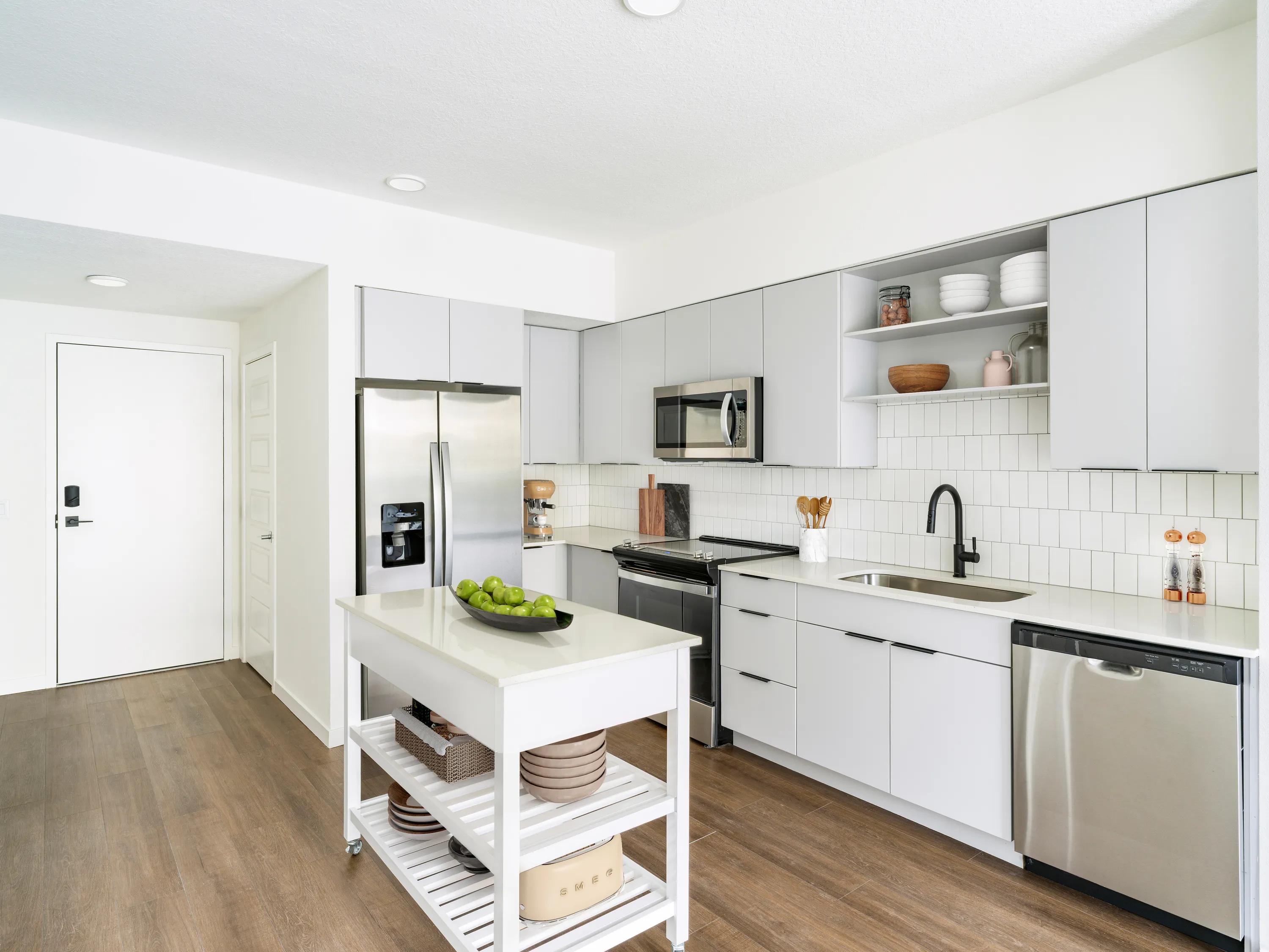 light cabinetry and moveable island modera encore apartments in tampa fl