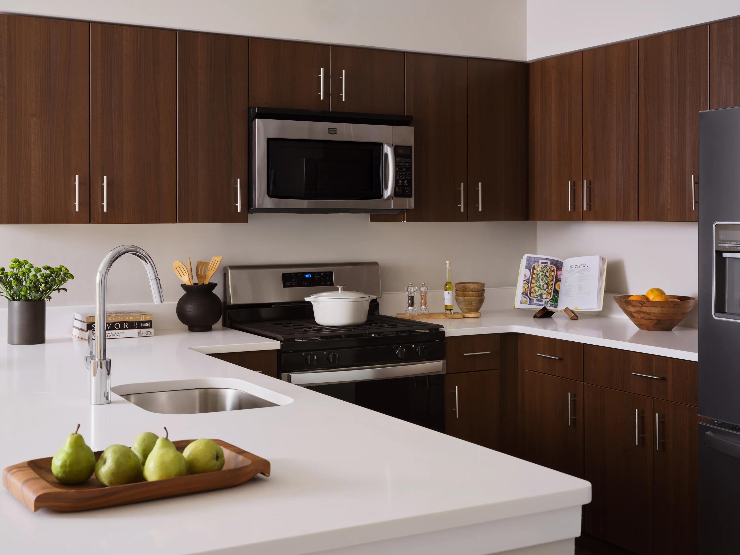 Kitchen island and peninsula seating the metropolitan at 40 park apartments in morristown n