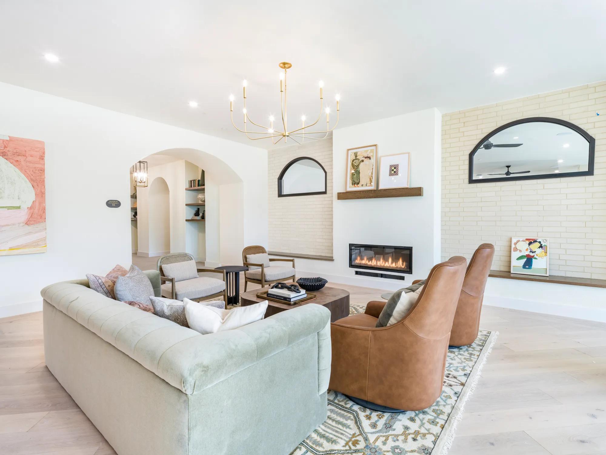 clubroom with fireplace and tasteful finishes modera trailhead apartment homes for rent in dallas texas