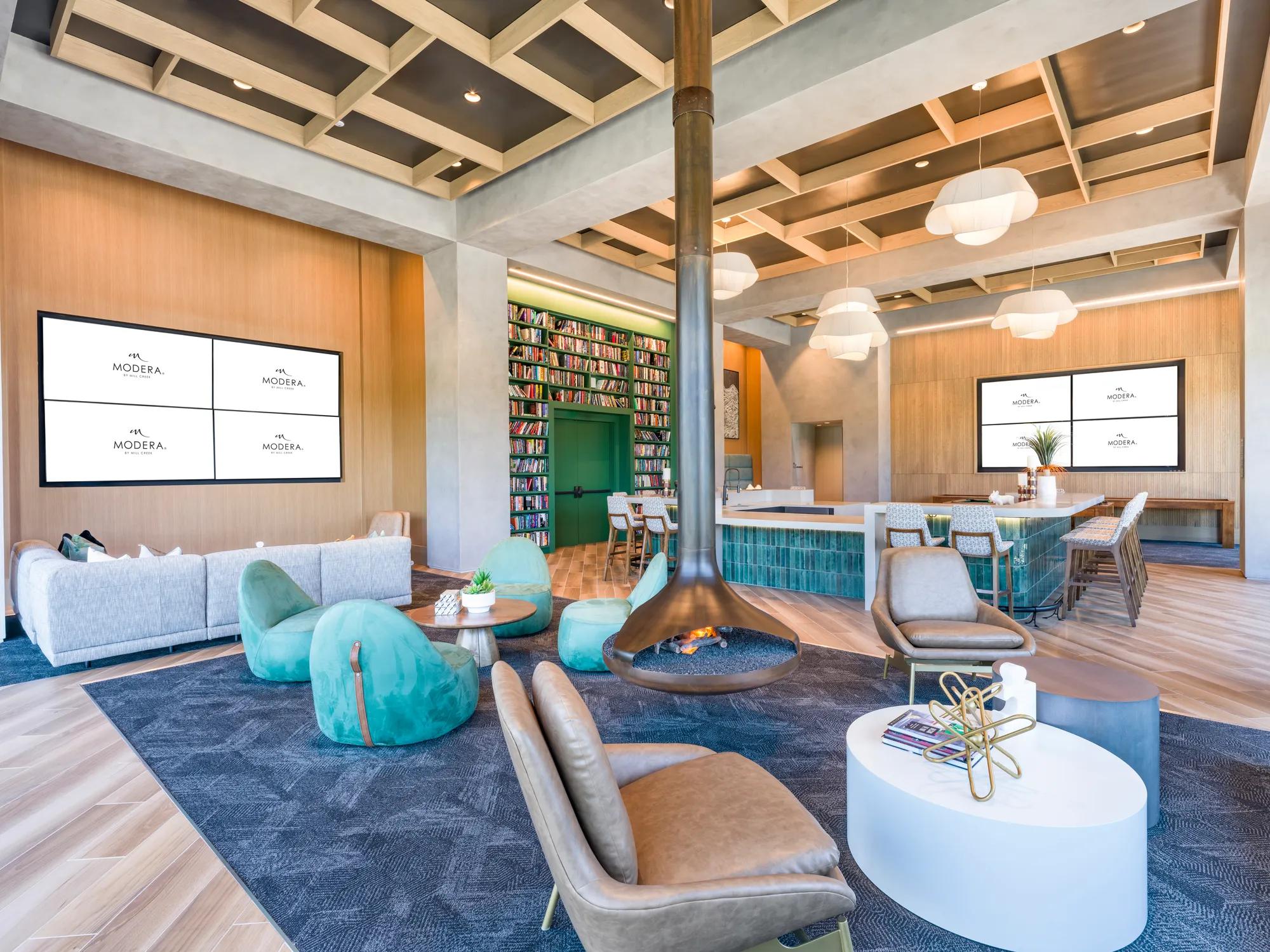 clubhouse with tvs and bookshelf at modera scottsdale apartment homes for rent in scottsdale az