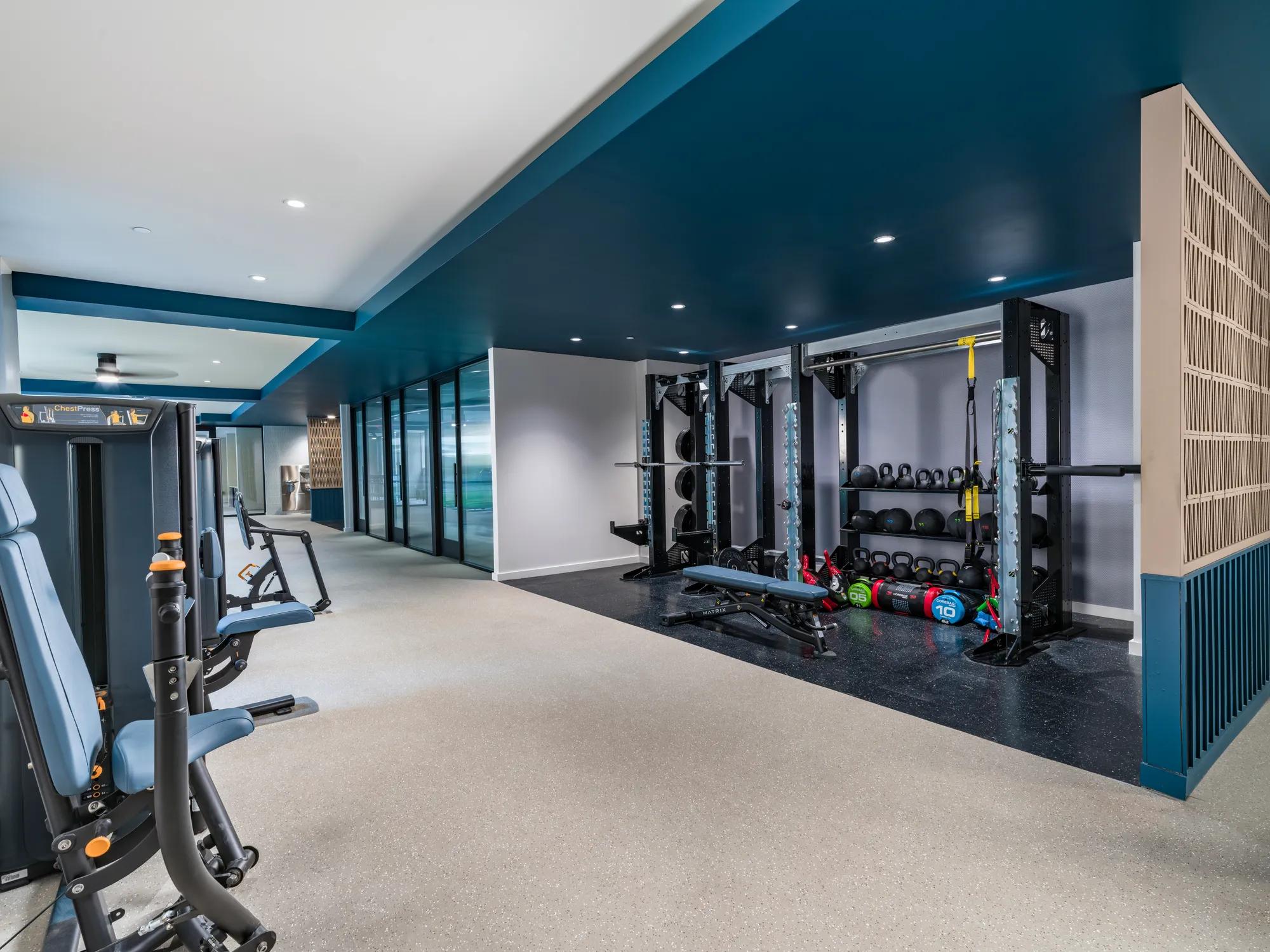 woman working out on yoga mat modera eado apartment homes for rent in austin texas