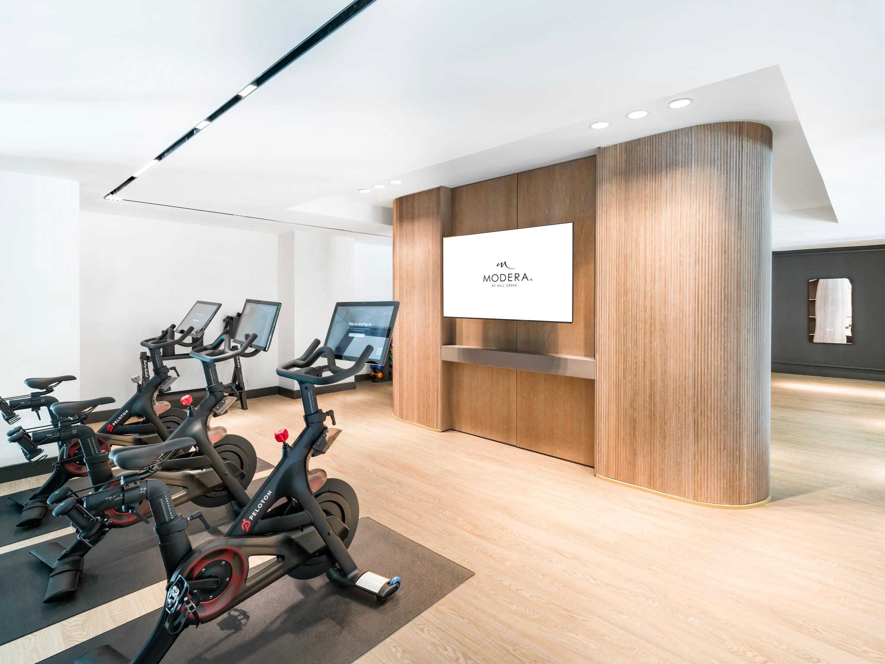 fitness center with cardio machines modera riverview apartment homes for rent in tn rendering