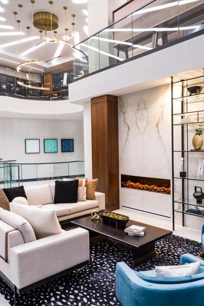 amenity space with seating and fireplace clubhouse modera mcgavock apartment homes for rent in nashville tn