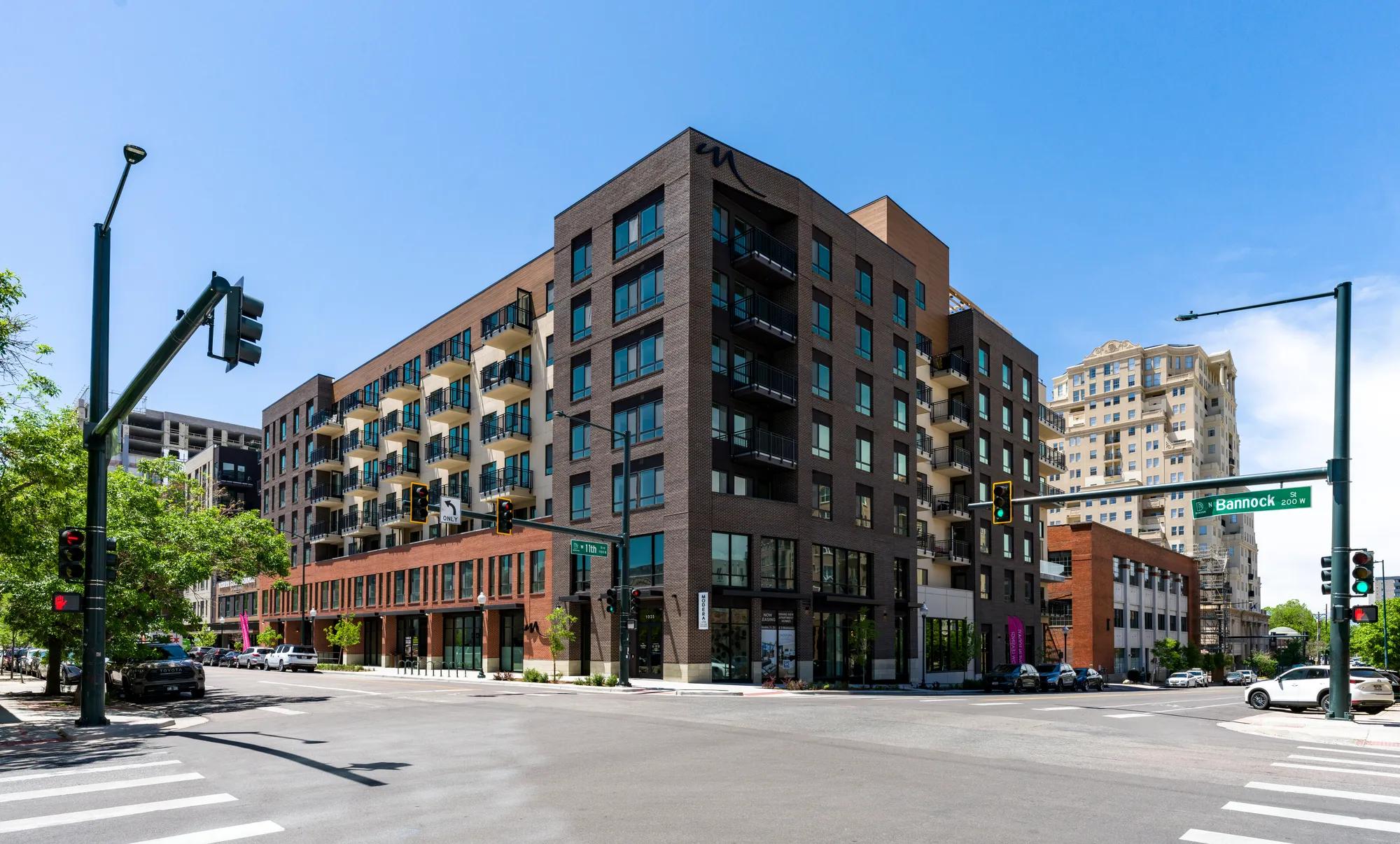 exterior building at intersection street level modera golden triangle apartment homes for rent in denver co