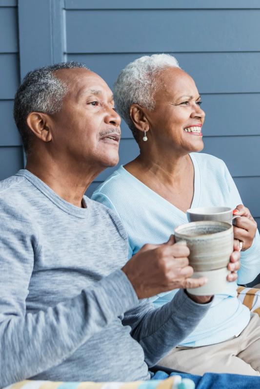 older couple enjoying a cup of coffee at home modera ridgeline apartments in mckinney tx