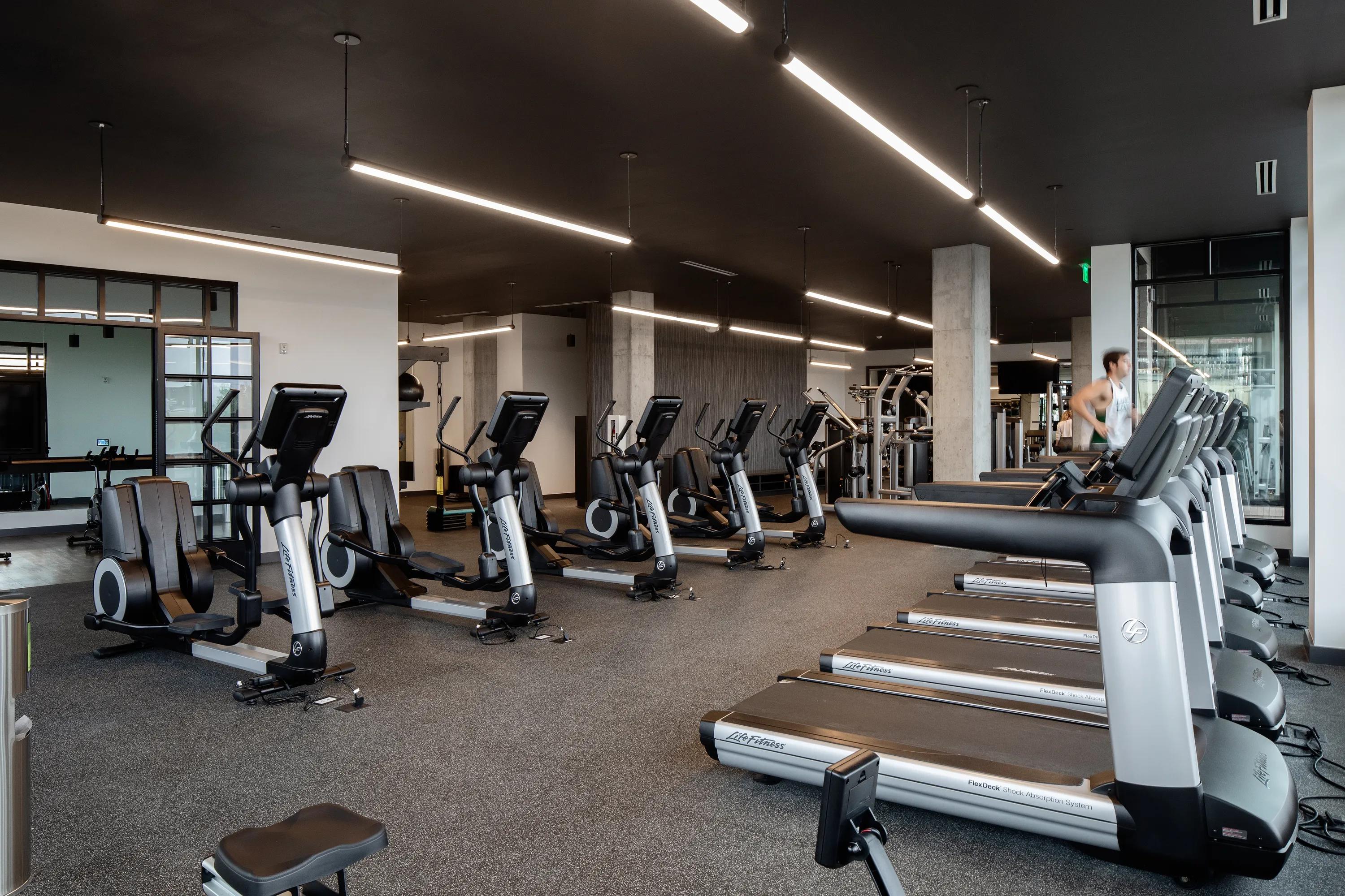 Club-quality 24-hour fitness studio with ballet barre modera art park in denver co