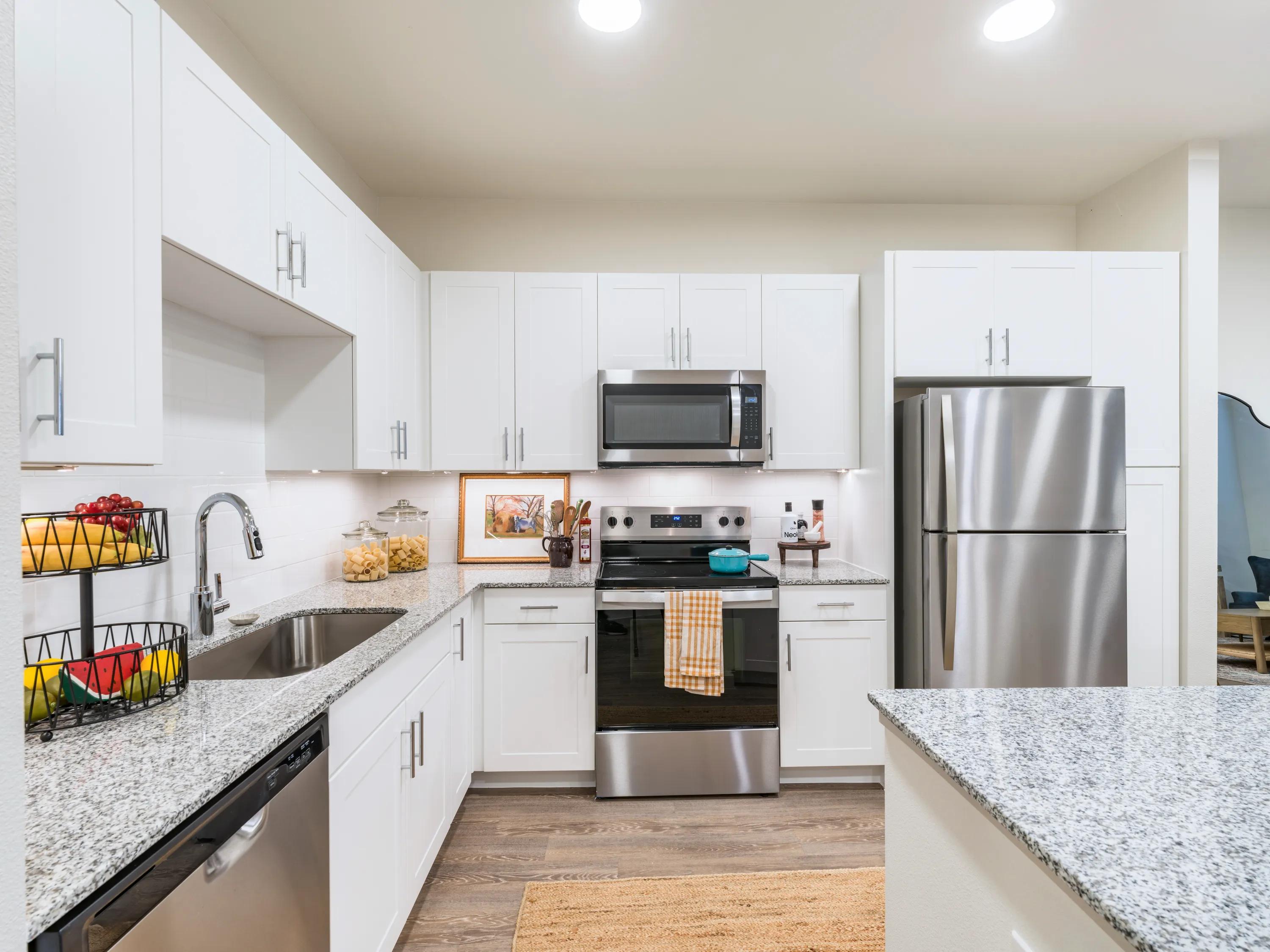 kitchen with pendant lighting and island beckett west fork apartment homes for rent in conroe tx