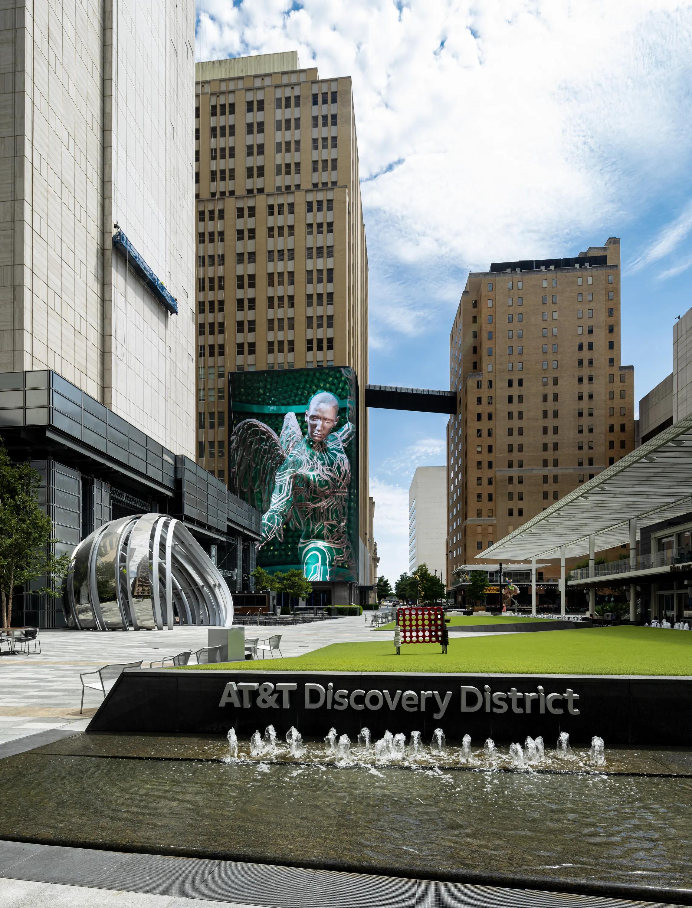 Nearby AT&T Discover Center fountain and water feature at Modera St. Paul Apartments Dallas TX
