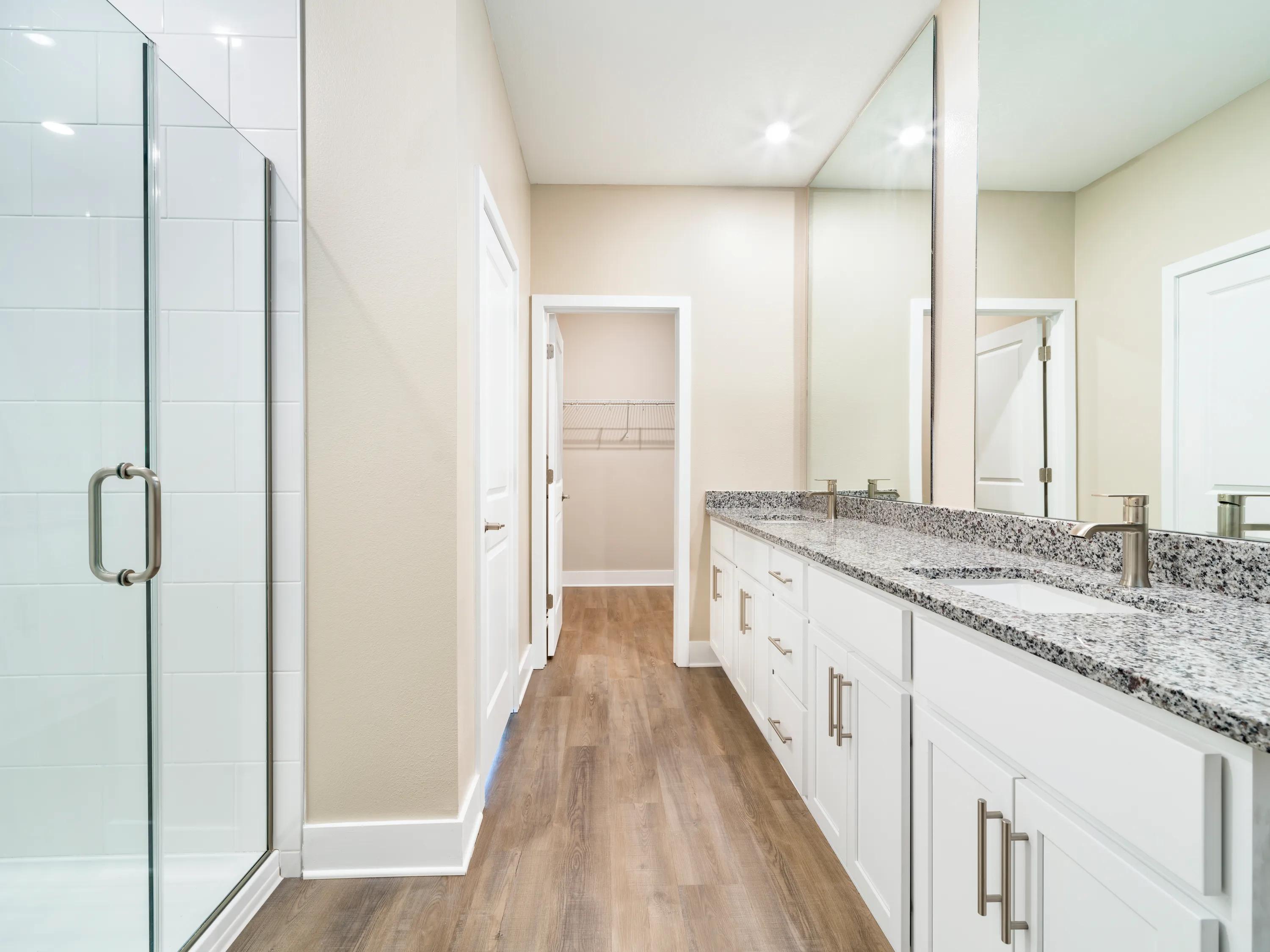 large bathroom with vanity and glass shower amavi kissimmee homes for rent in kissimmee fl