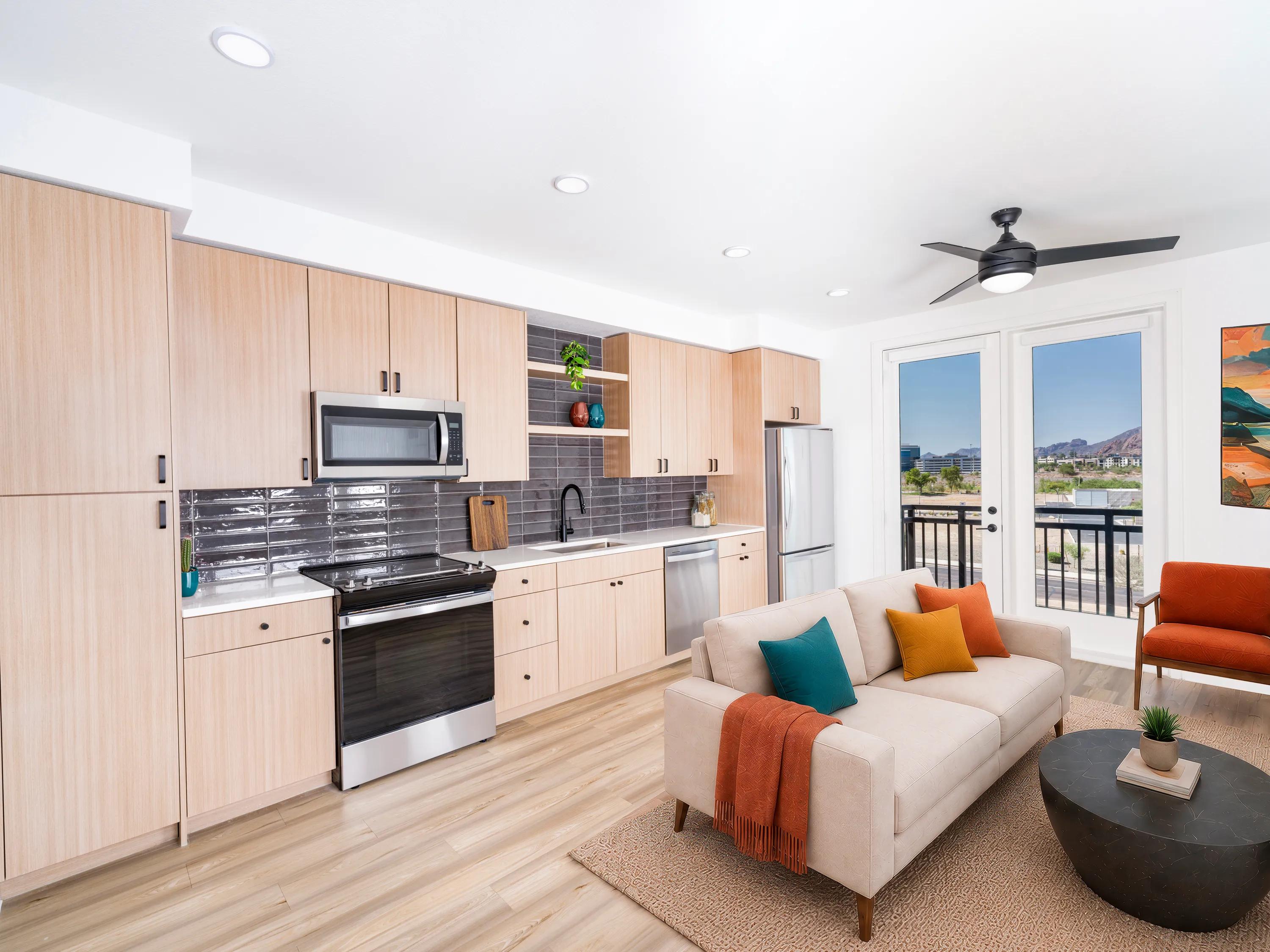 Gourmet kitchens with quartz countertops, custom cabinetry with soft close, and under-cabinet lighting modera rio salado apartments in tempe az