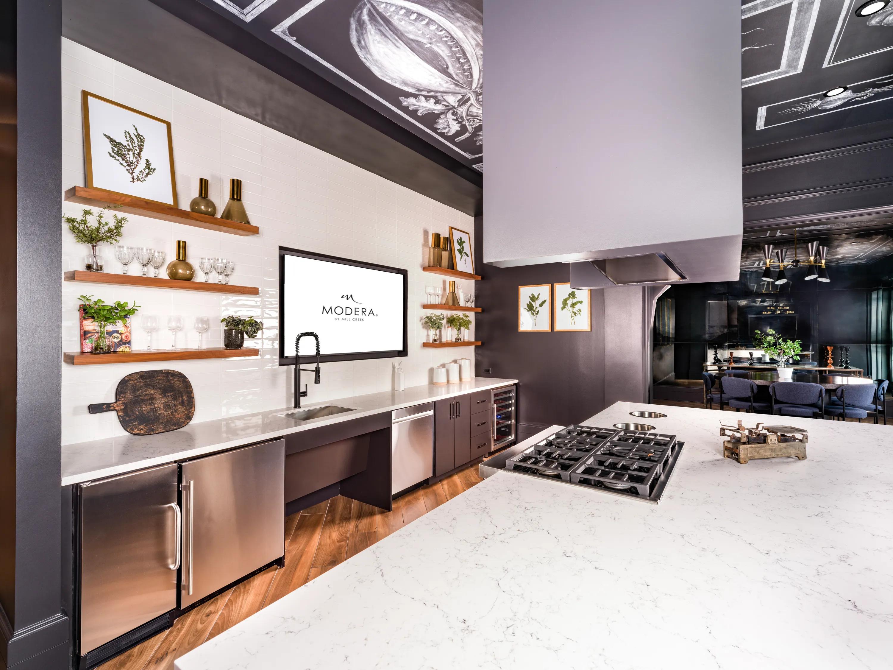 demonstation kitchen for guests and residents modera old ivy apartments in atlanta ga