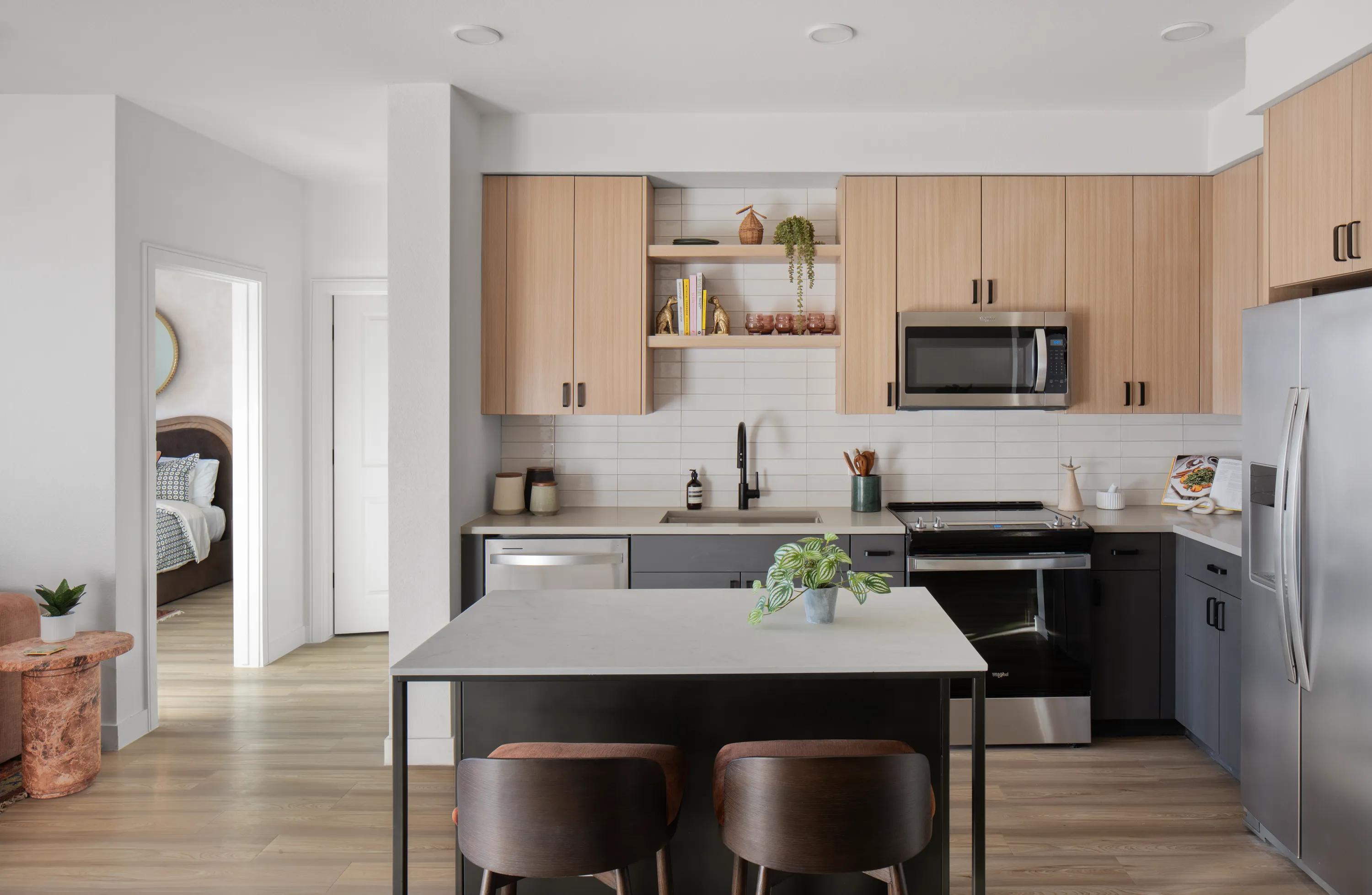 Large chef&rsquo;s island with built-in storage or movable kitchen island modera rio salado apartments in tempe az