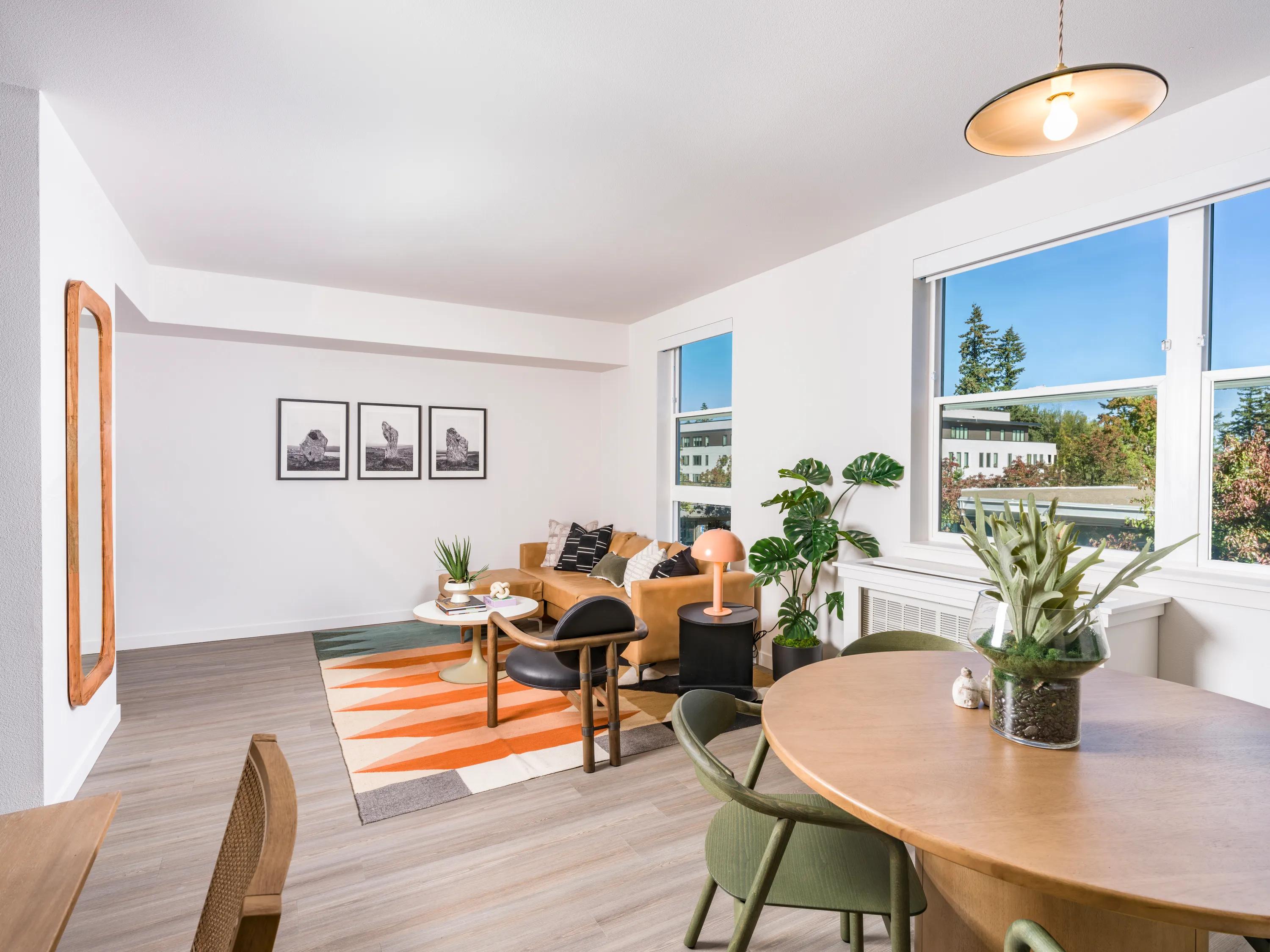 large living areas with hardwood style flooring
