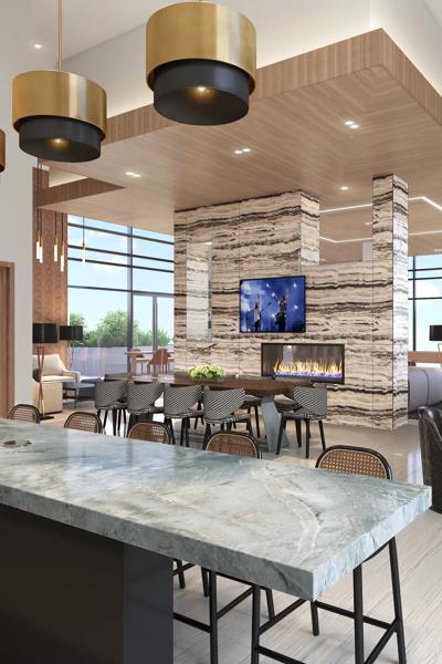 amenity space with seating and fireplace clubhouse modera mcgavock apartment homes for rent in nashville tn