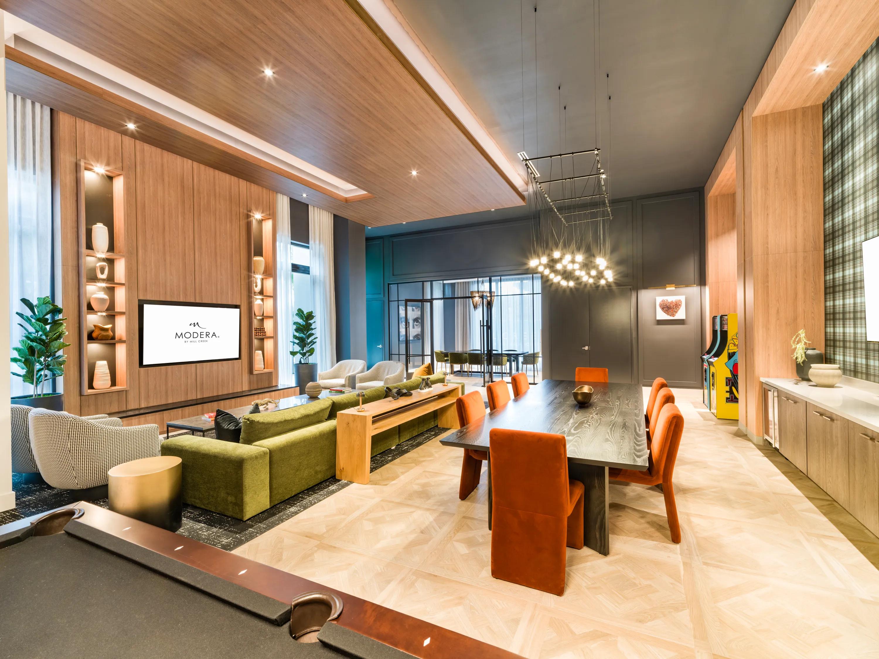community lounge room with comfortable and cozy seating modera aventura apartments in miami fl