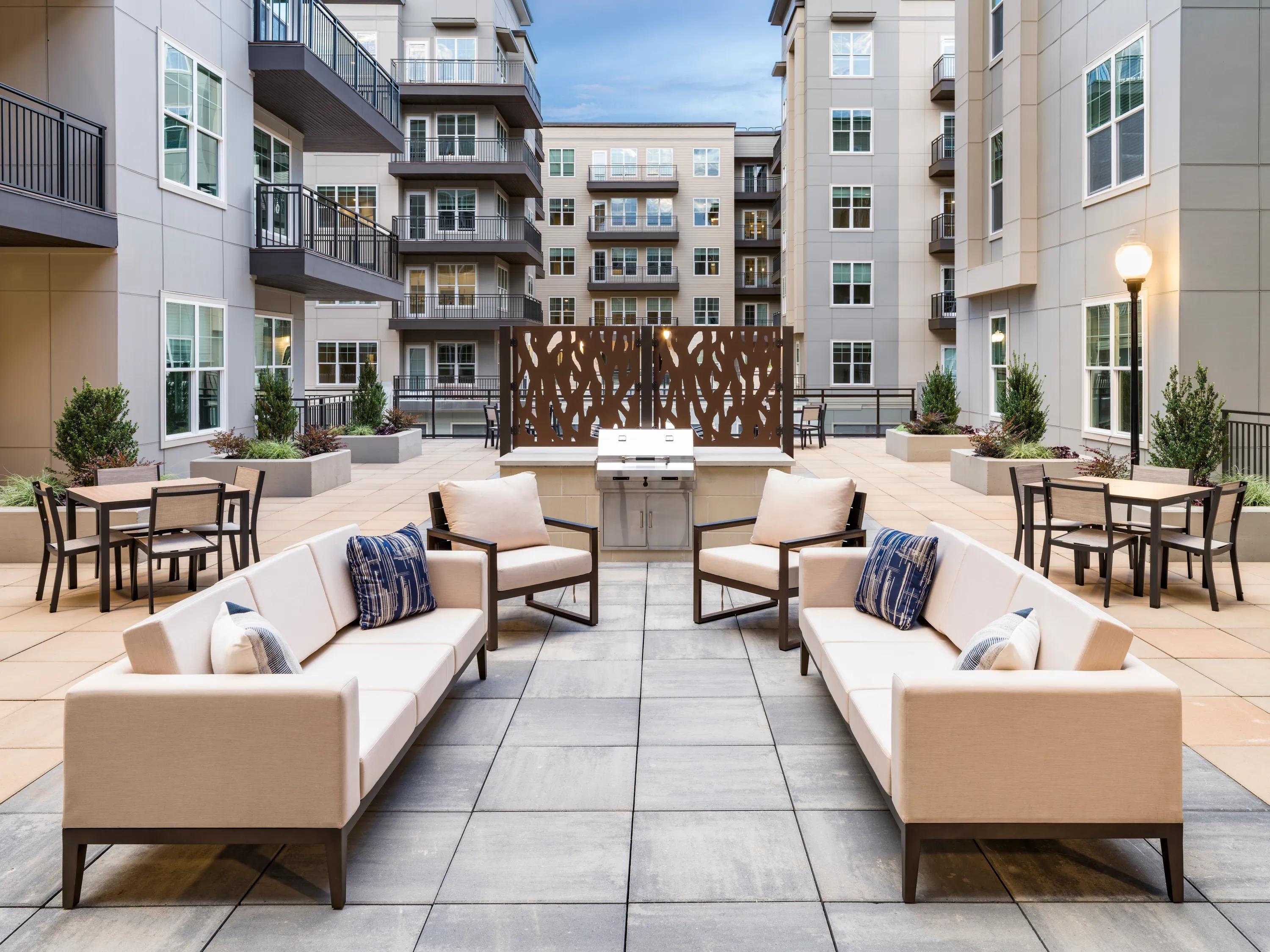 outdoor lounge with grilling area modera liberty row charlotte nc apartments