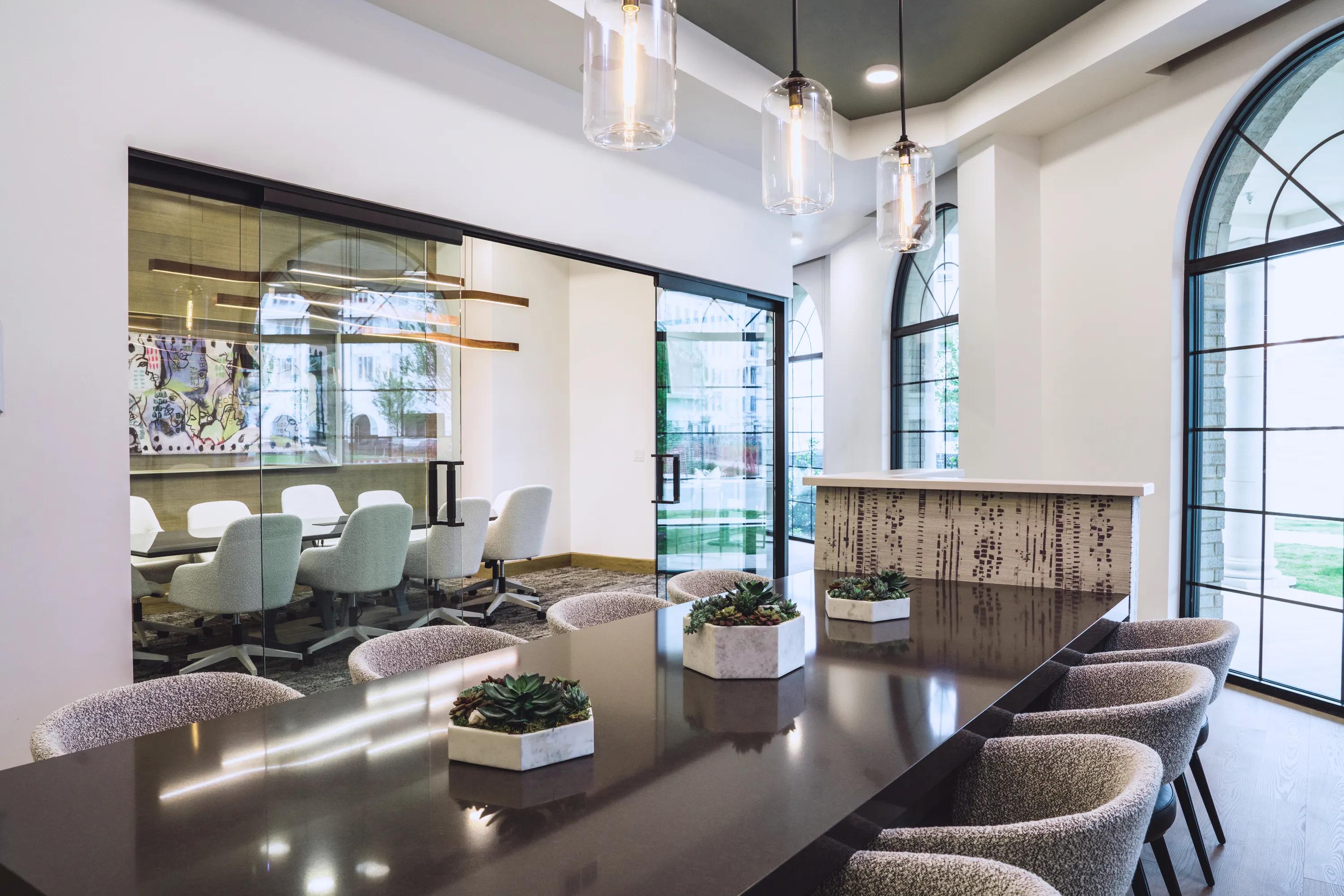 Coworking space with comfortable seating areas modera frisco square apartments in tx