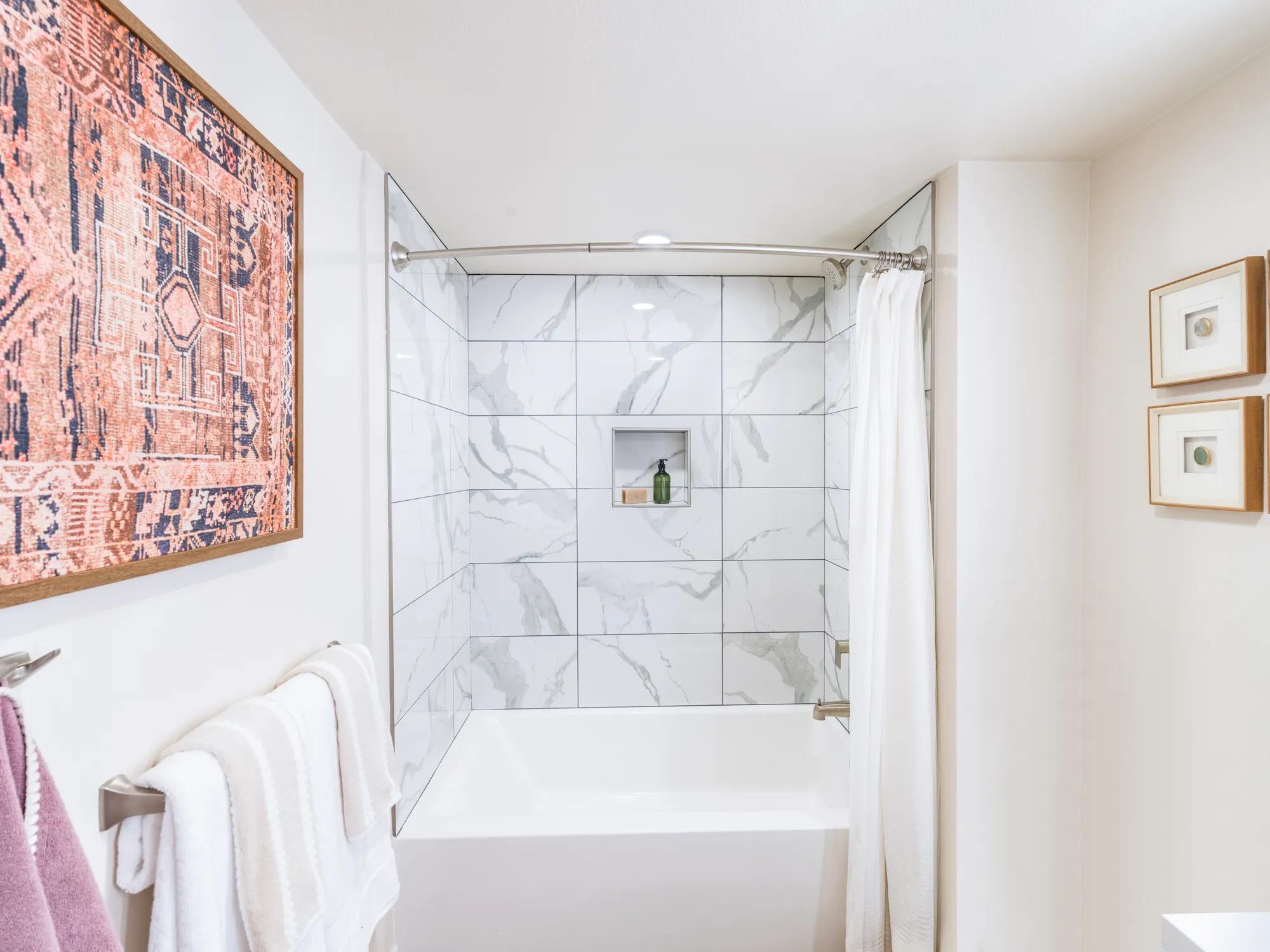 bathtub and shower in bathroom modera argyle apartment homes for rent