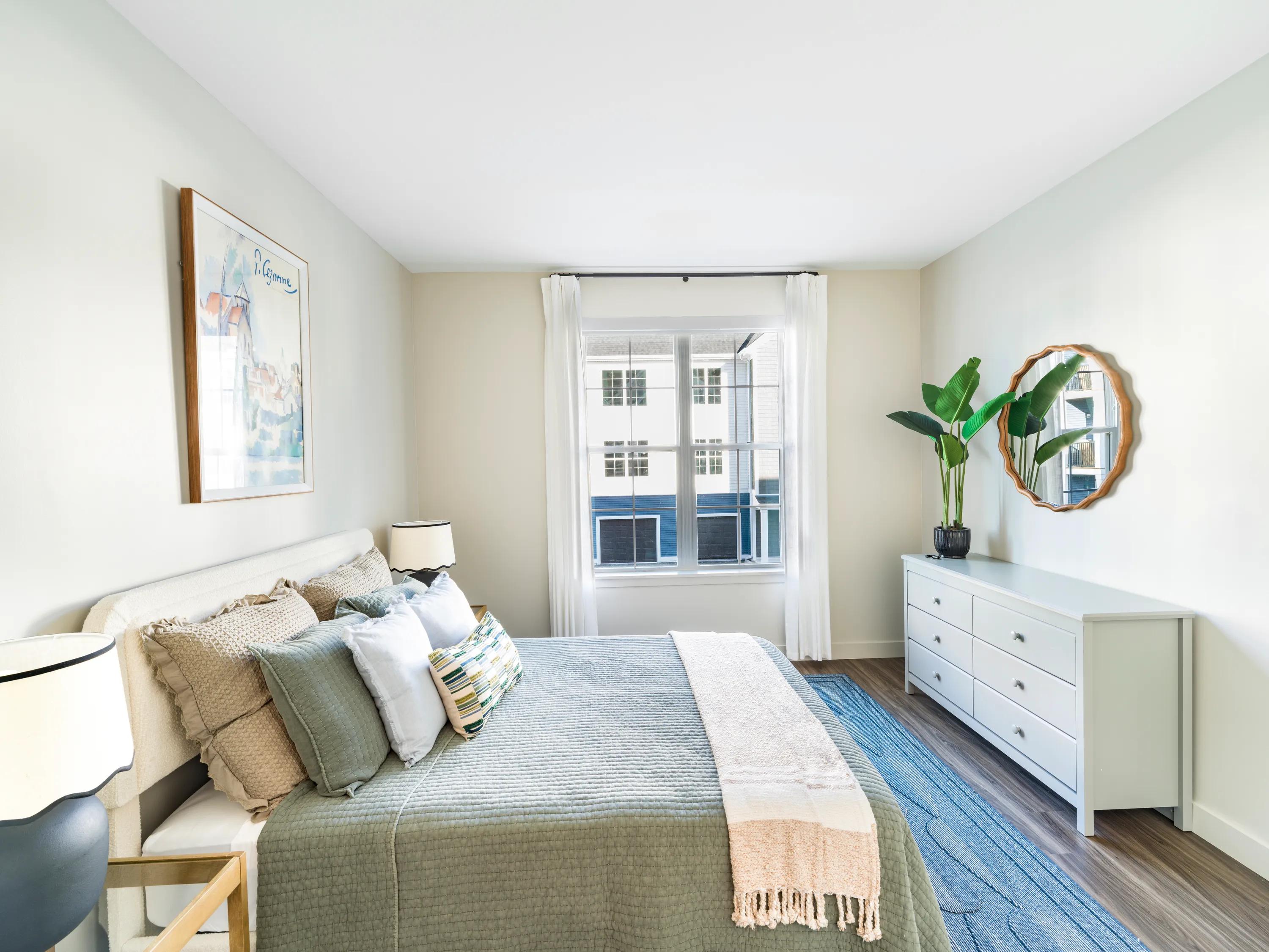 spacious bedroom area with large windows modera south shore apartment homes for rent in marshfield ma