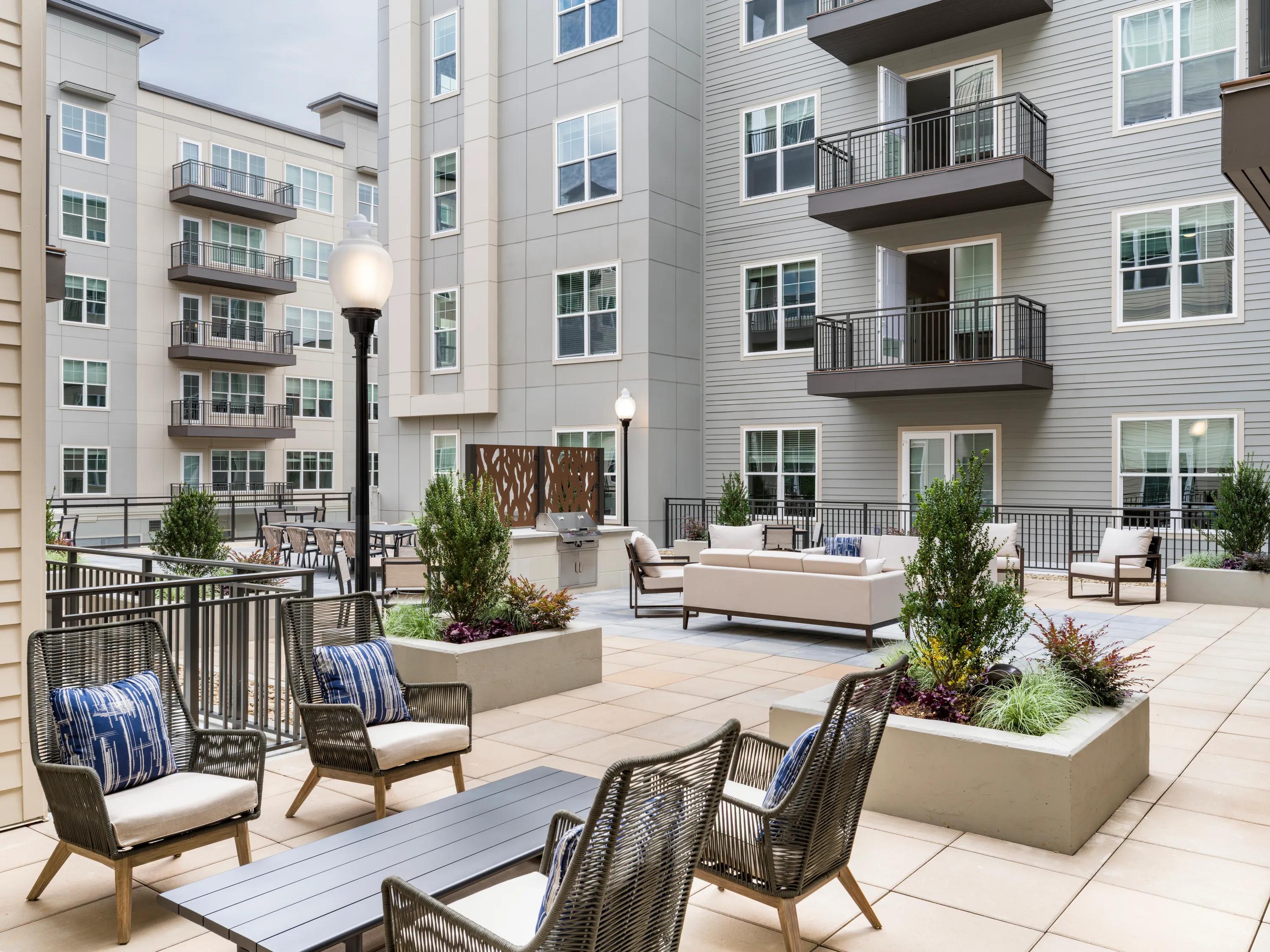 Lush landscaped courtyards with lounge areas
