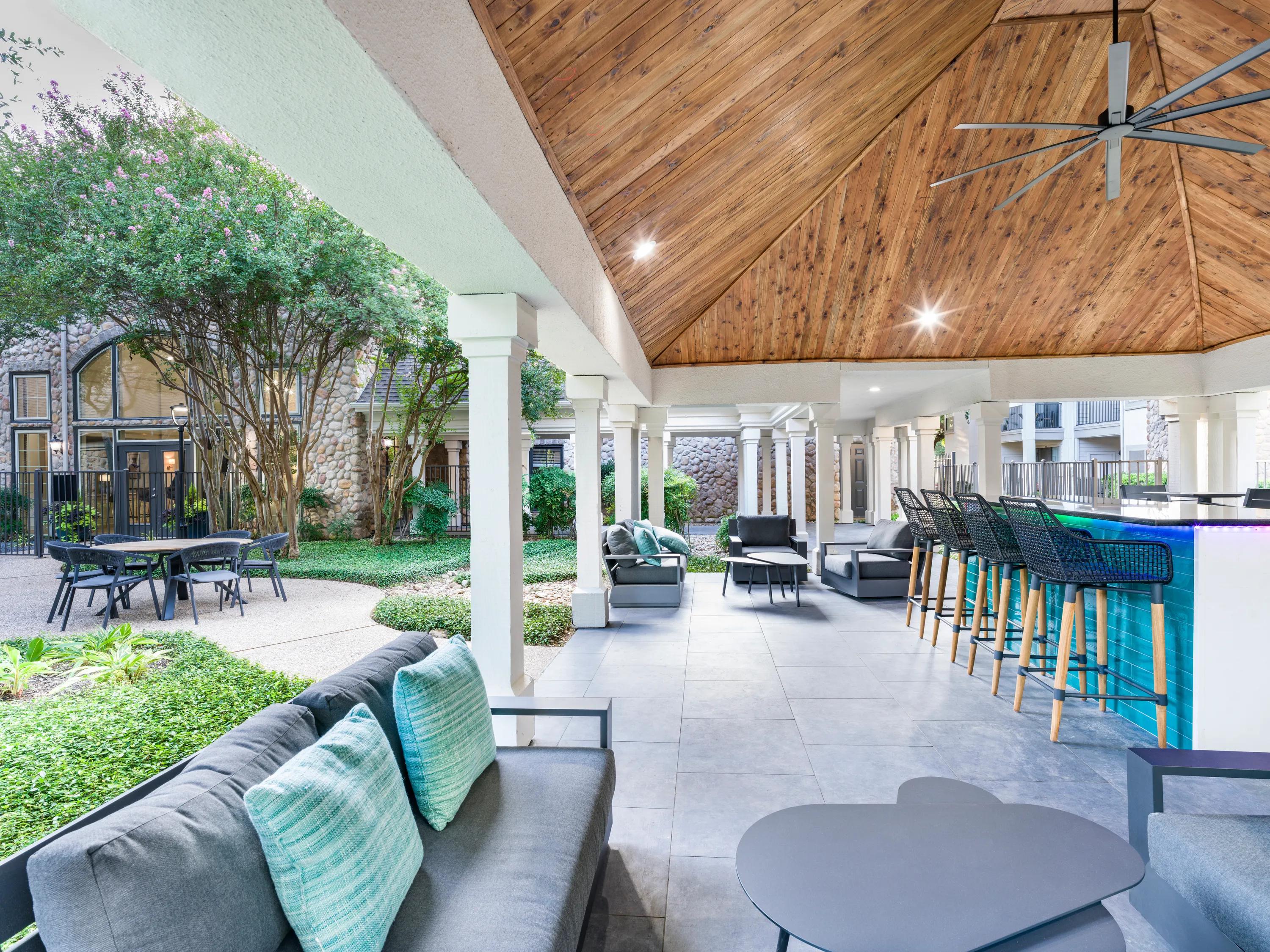 outdoor lounge pavilion with seating dalister sunset valley apartment homes for rent in austin tx