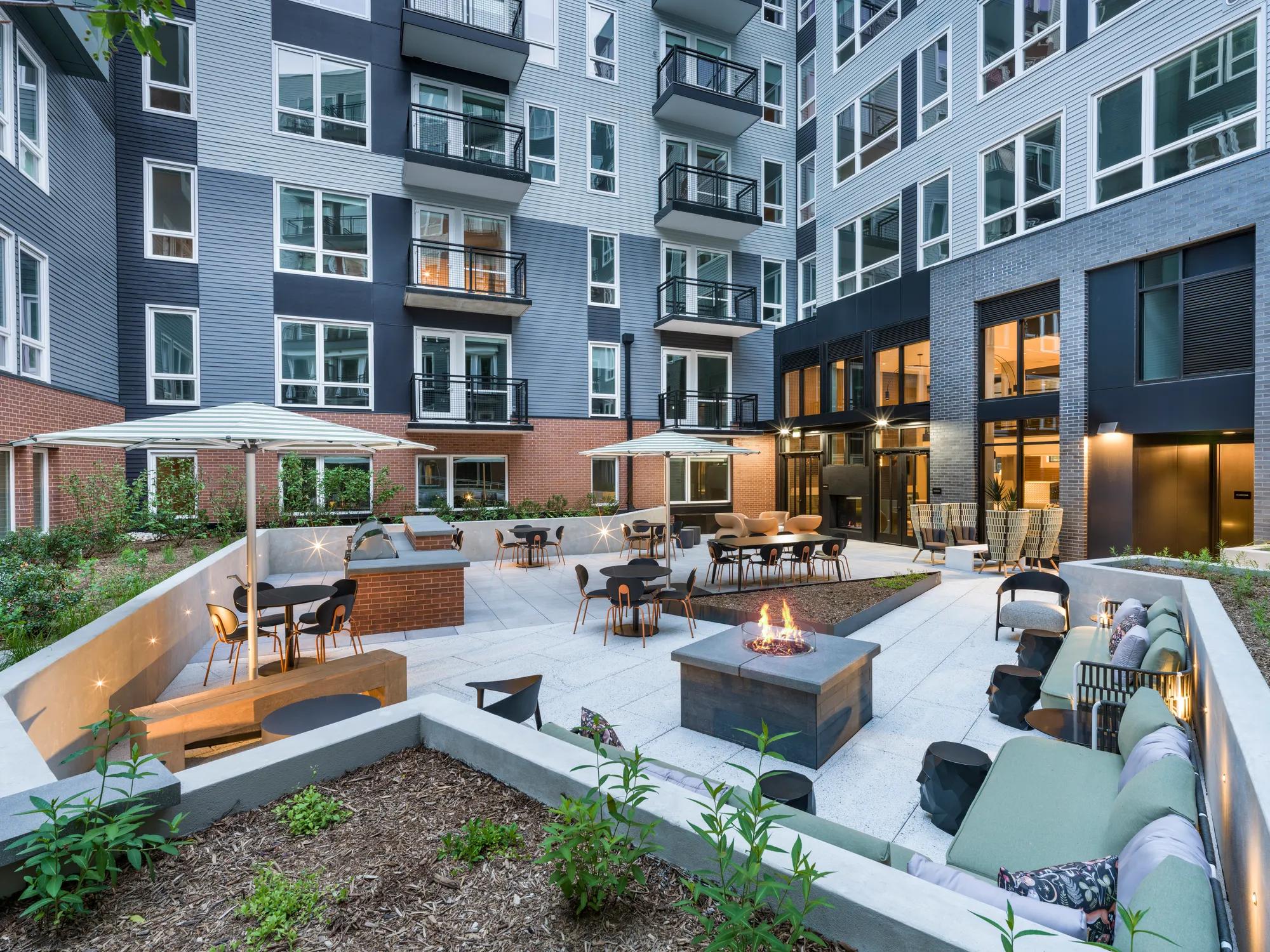 courtyard with lounge seating modera h street apartment homes for rent in washington dc