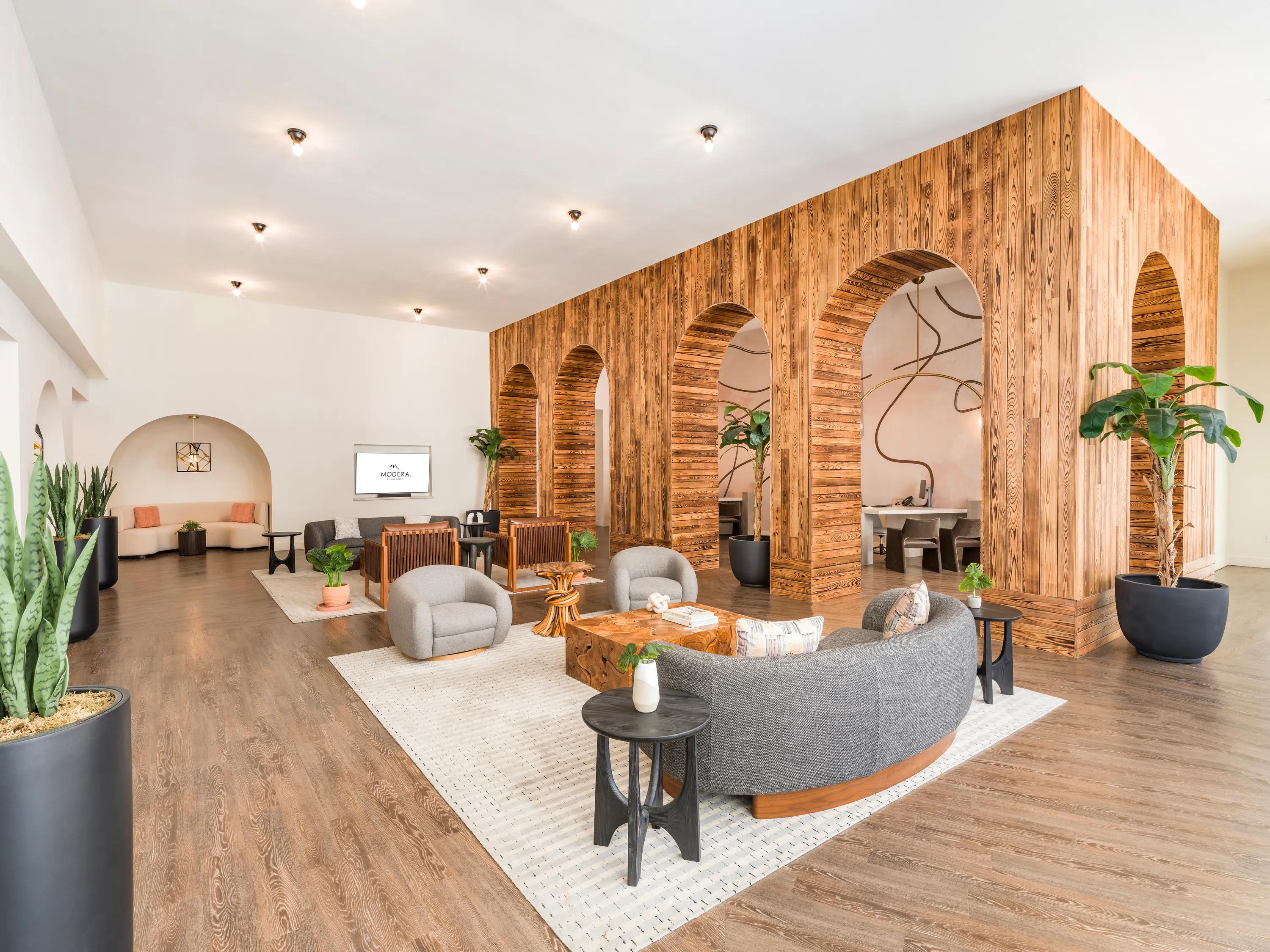 lobby with arched walls and seating modera st petersburg apartment homes for rent in florida