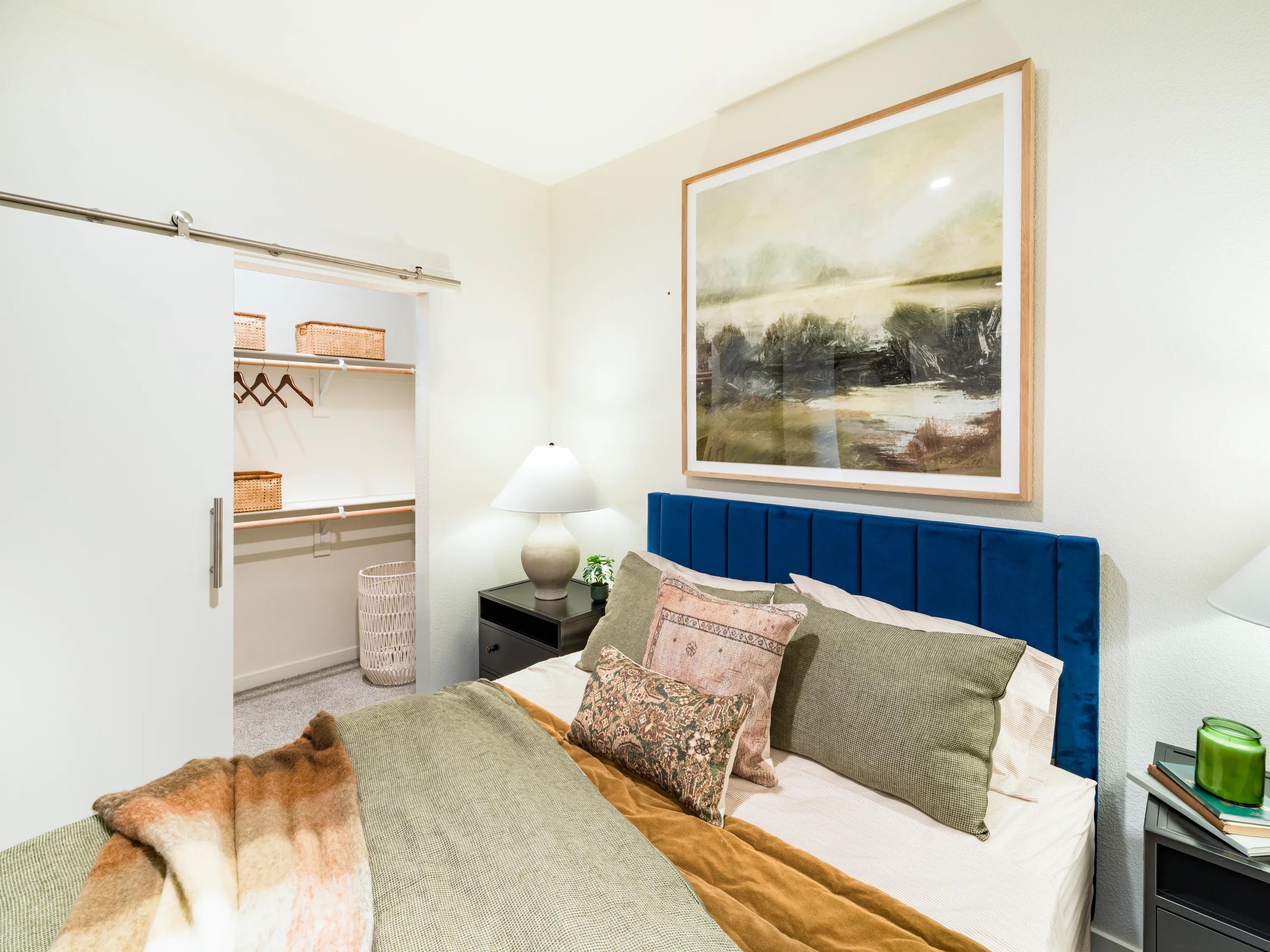 spacious bedroom with modern art modera university park apartment homes for rent in denver co