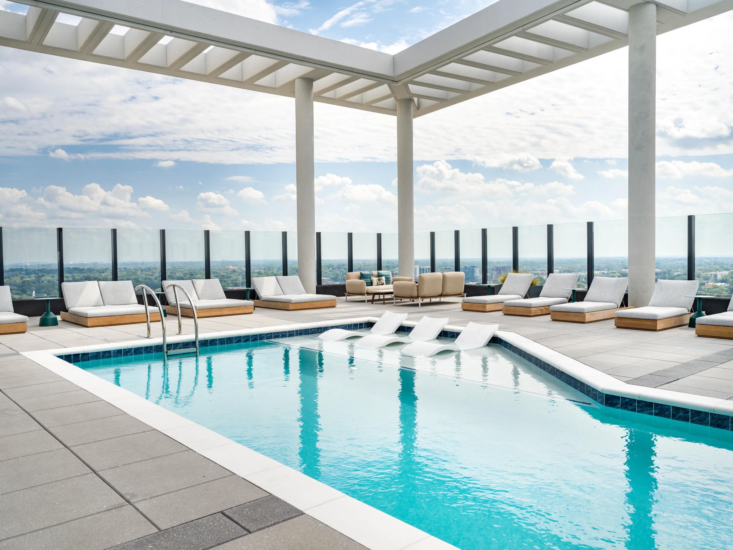 stunning pool with lounge chairs modera parkside apartment homes for rent in atlanta ga