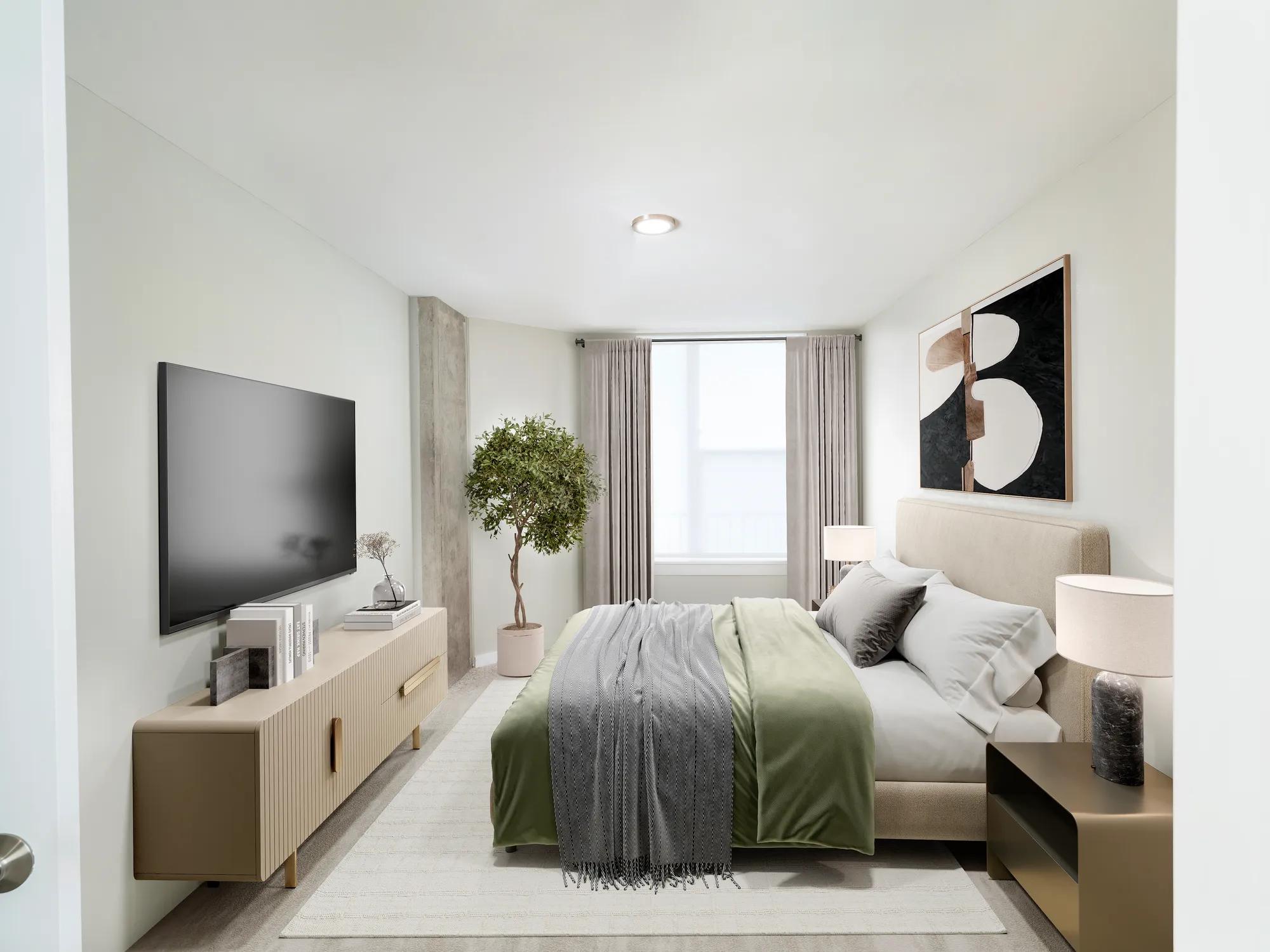 bedroom with large windows and tasteful furniture modera loso apartment homes for rent in charlotte nc