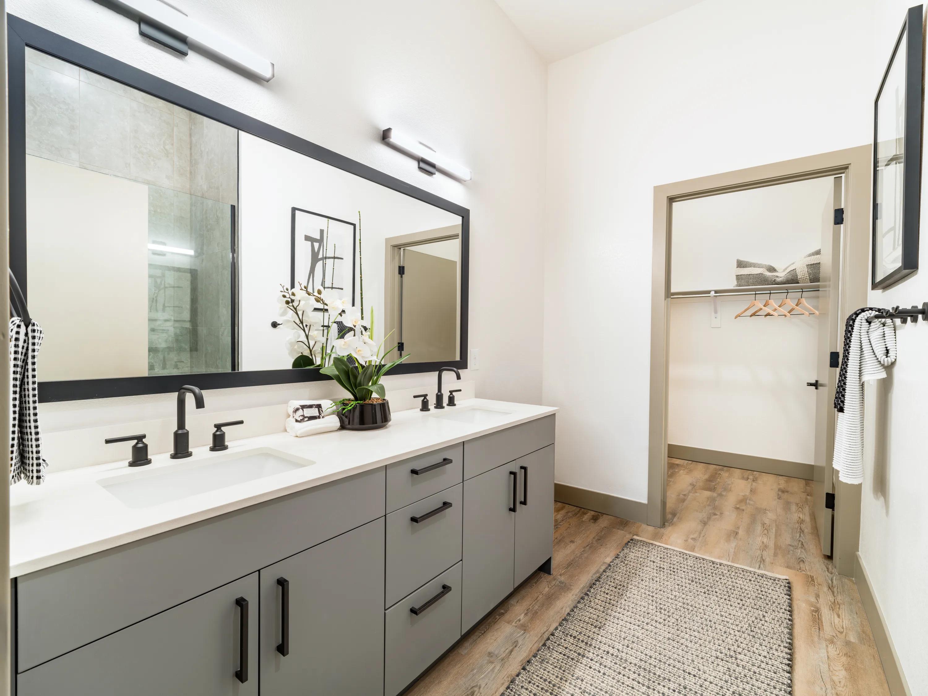 large bathroom with tile surround tub and double vanity modera chandler apartments for rent in chandler az