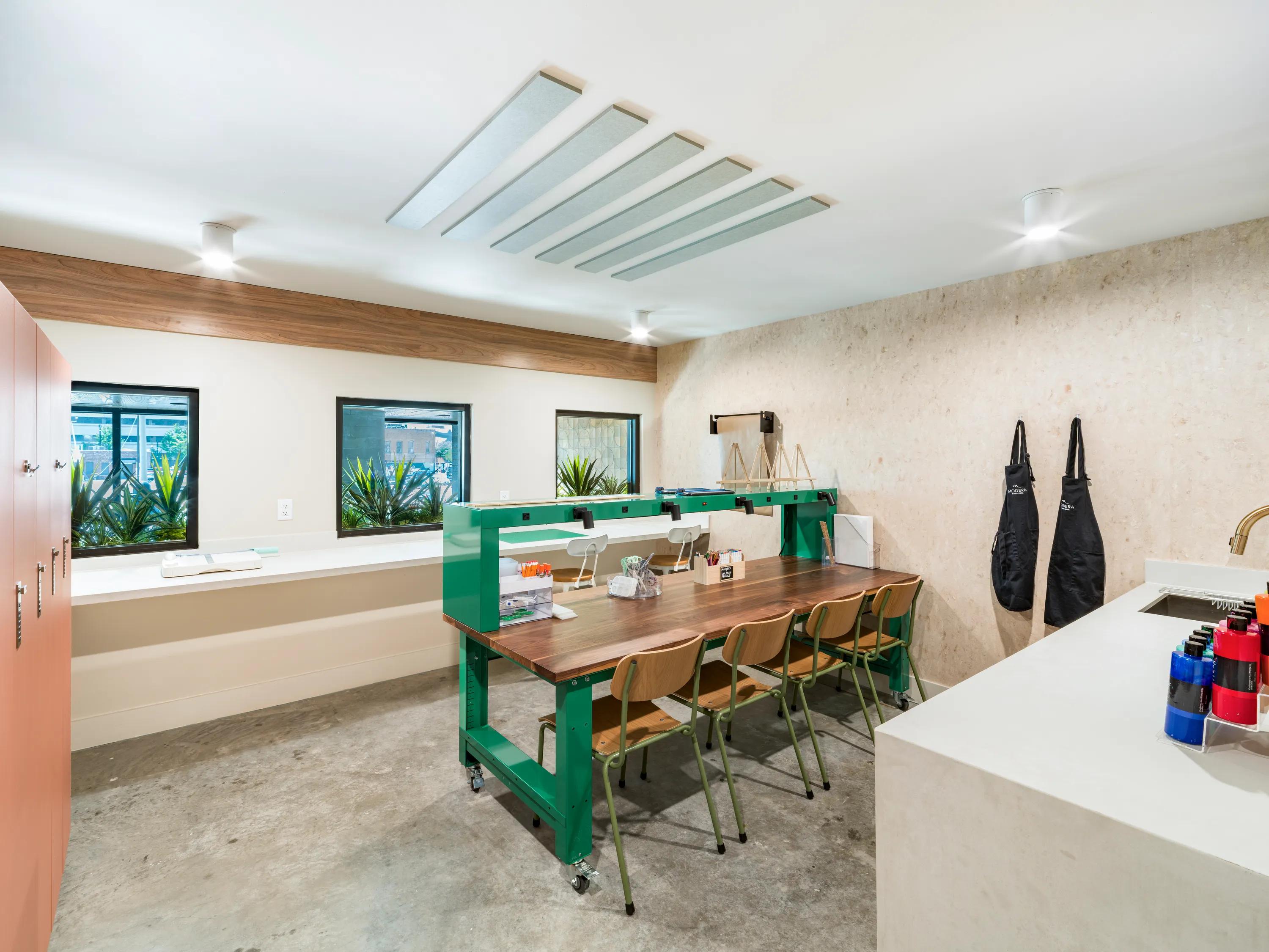 makers space with tables and lockers modera st paul apartment homes for rent
