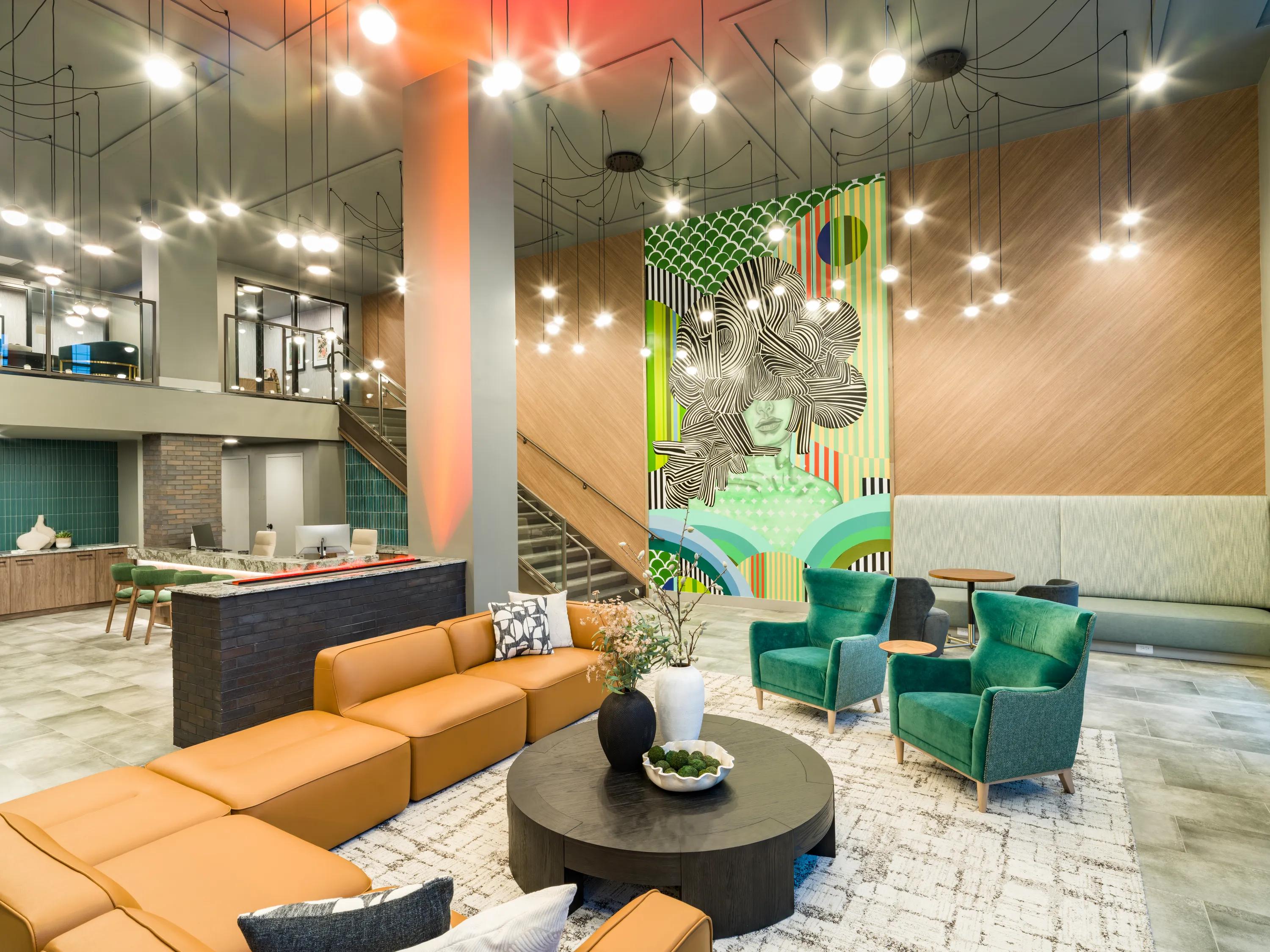 Expansive clubroom with gathering space and comfortable seating