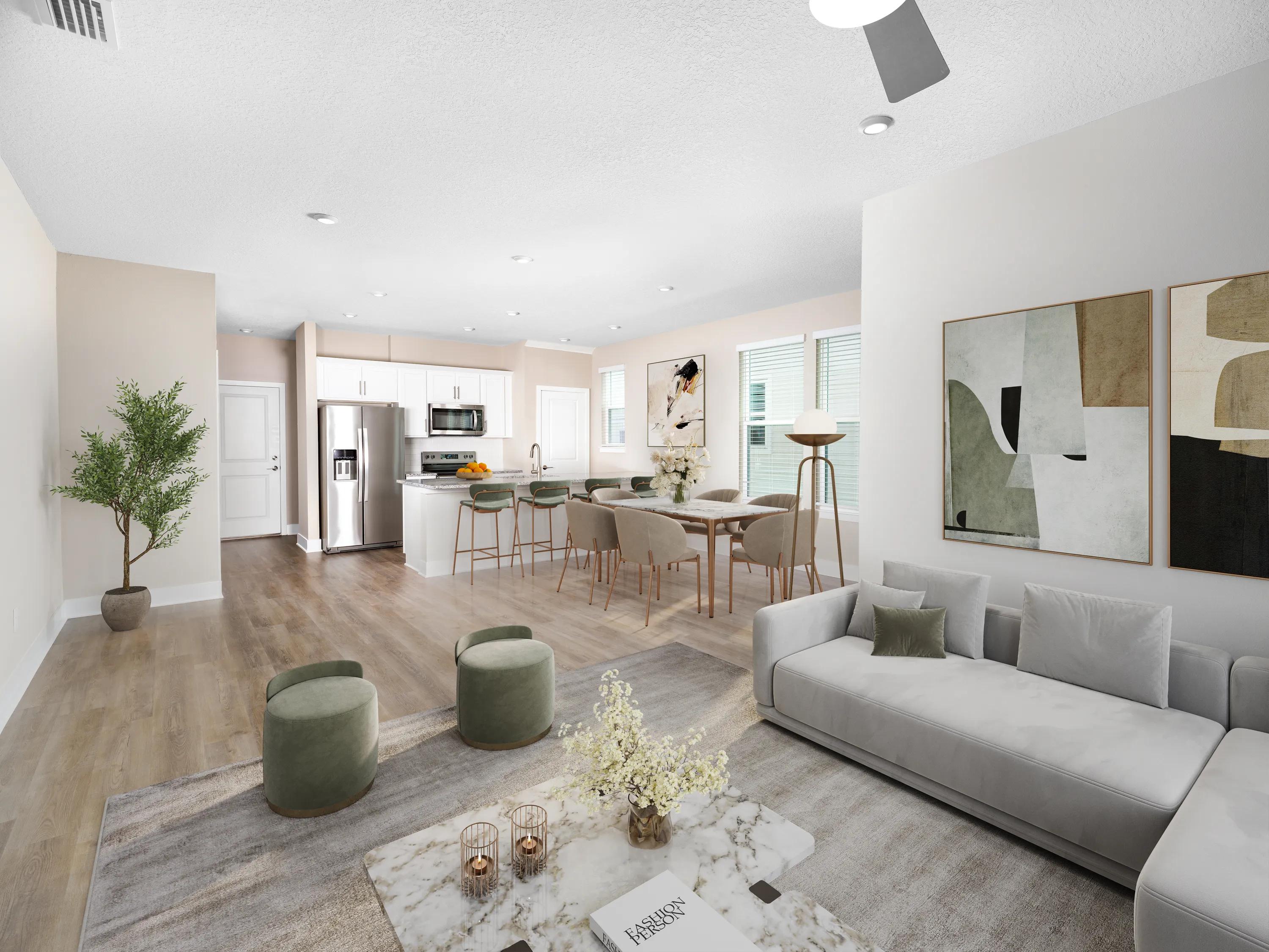 spacious living and kitchen area with comfortable and stylish seating amavi kissimmee homes for rent in kissimmee fl