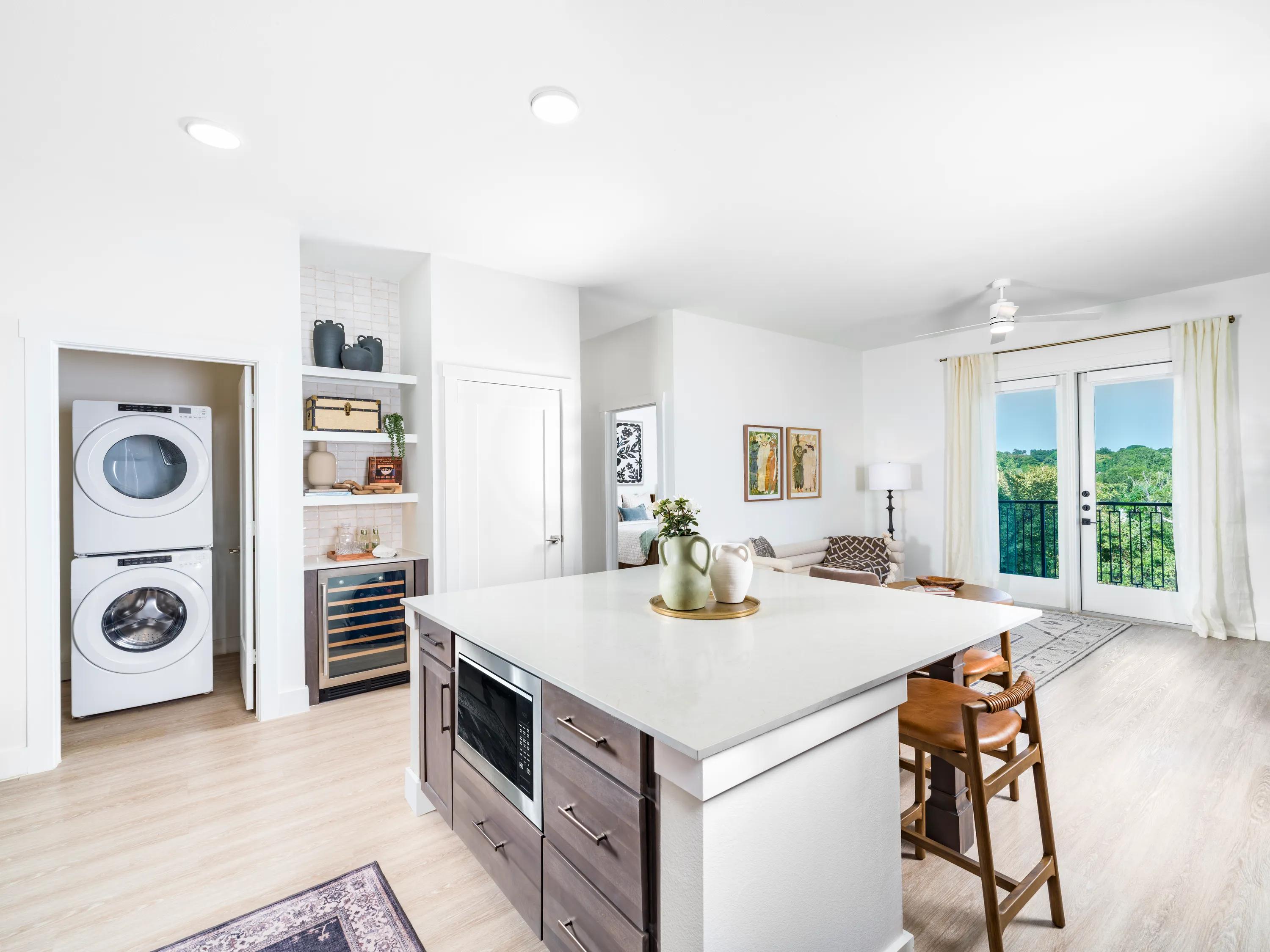 premium home kitchen with wine cooler microwave drawer and island modera trailhead apartment homes for rent in dallas tx