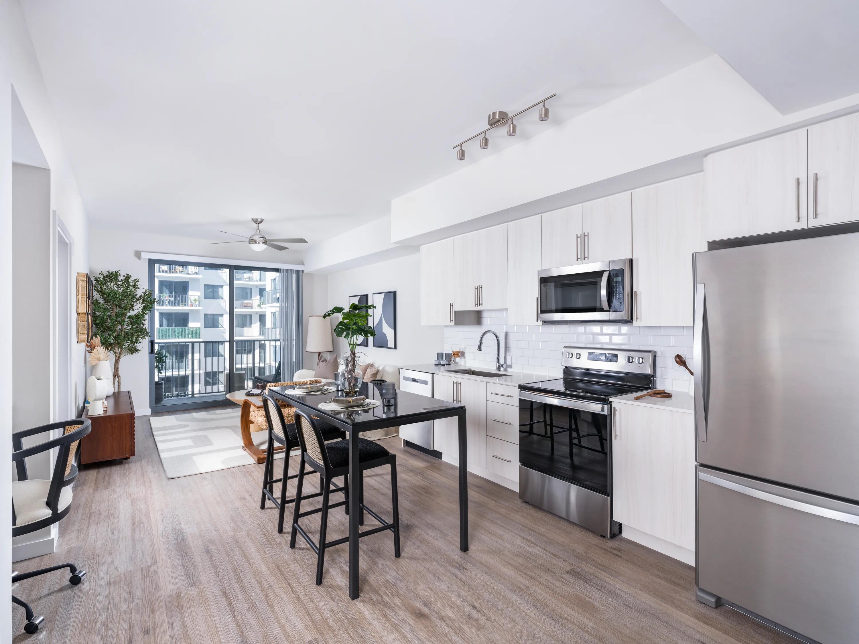 spacious kitchen with stainless steel appliances modera st petersburg apartments for rent