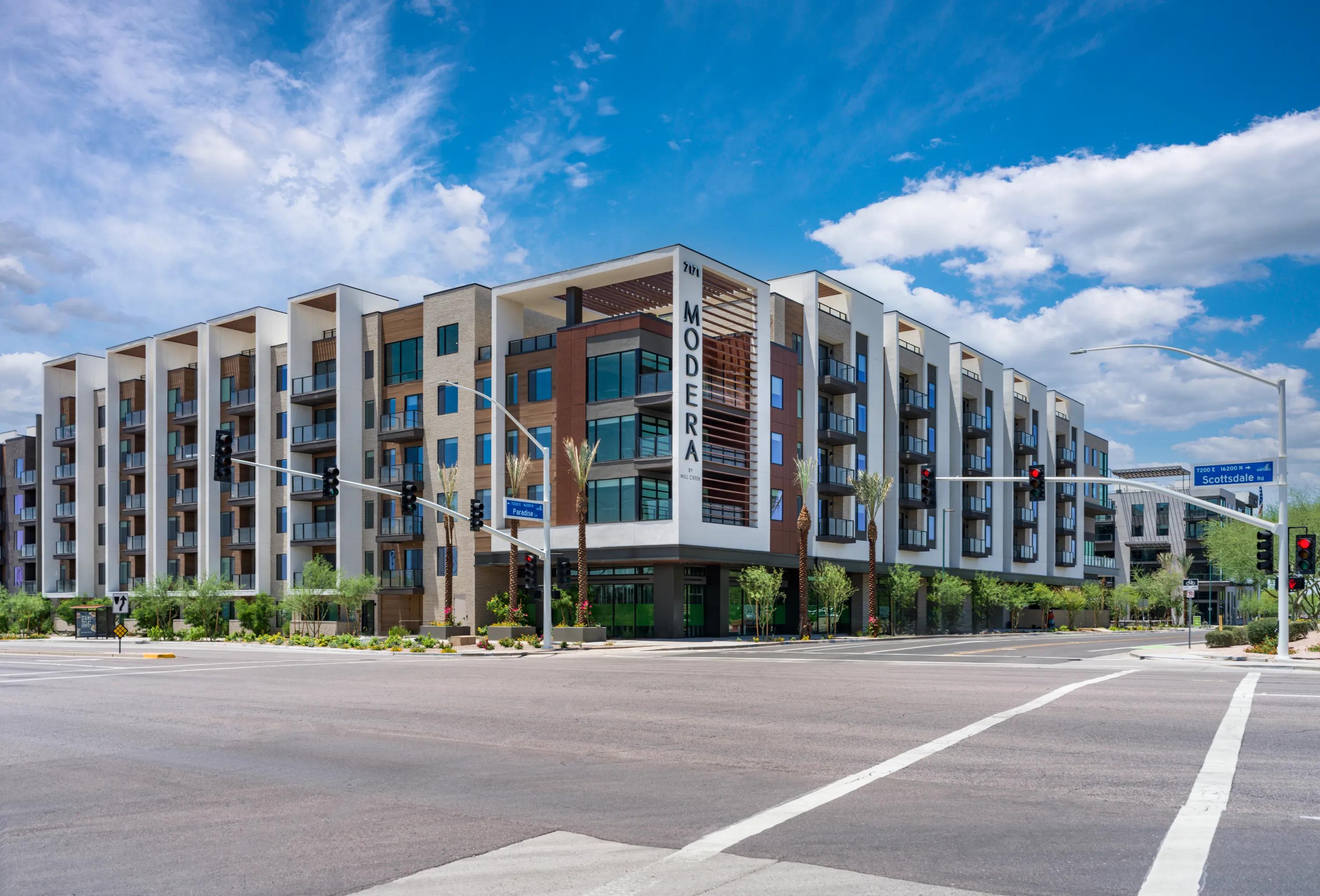 street level view of building exterior adjacent to road rendering modera scottsdale apartment homes for rent in az